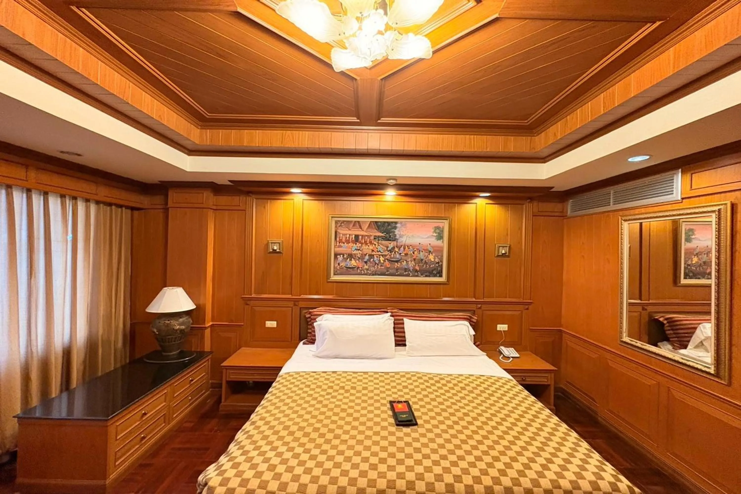 Bed in Taksila Hotel