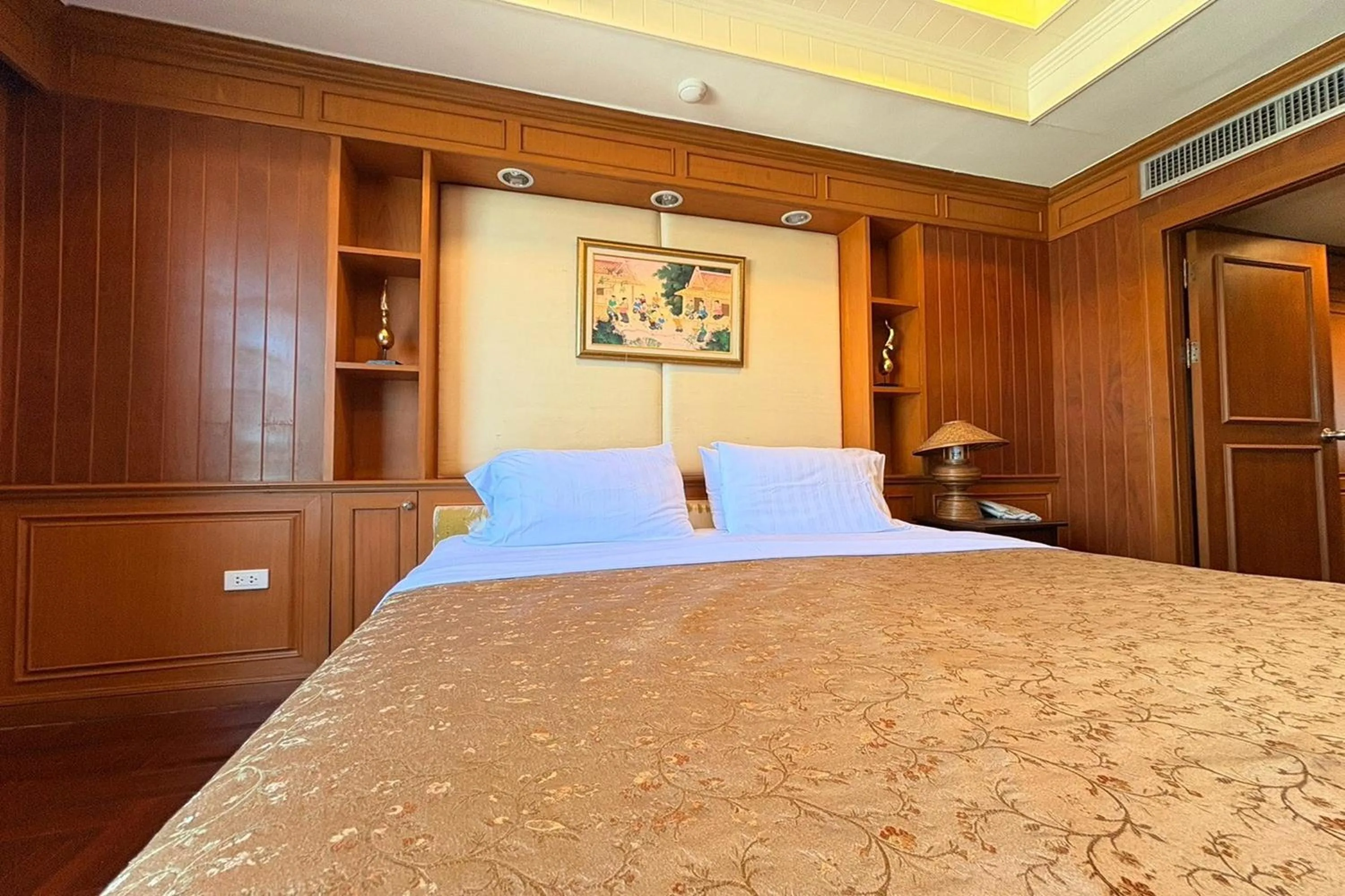 Bed in Taksila Hotel