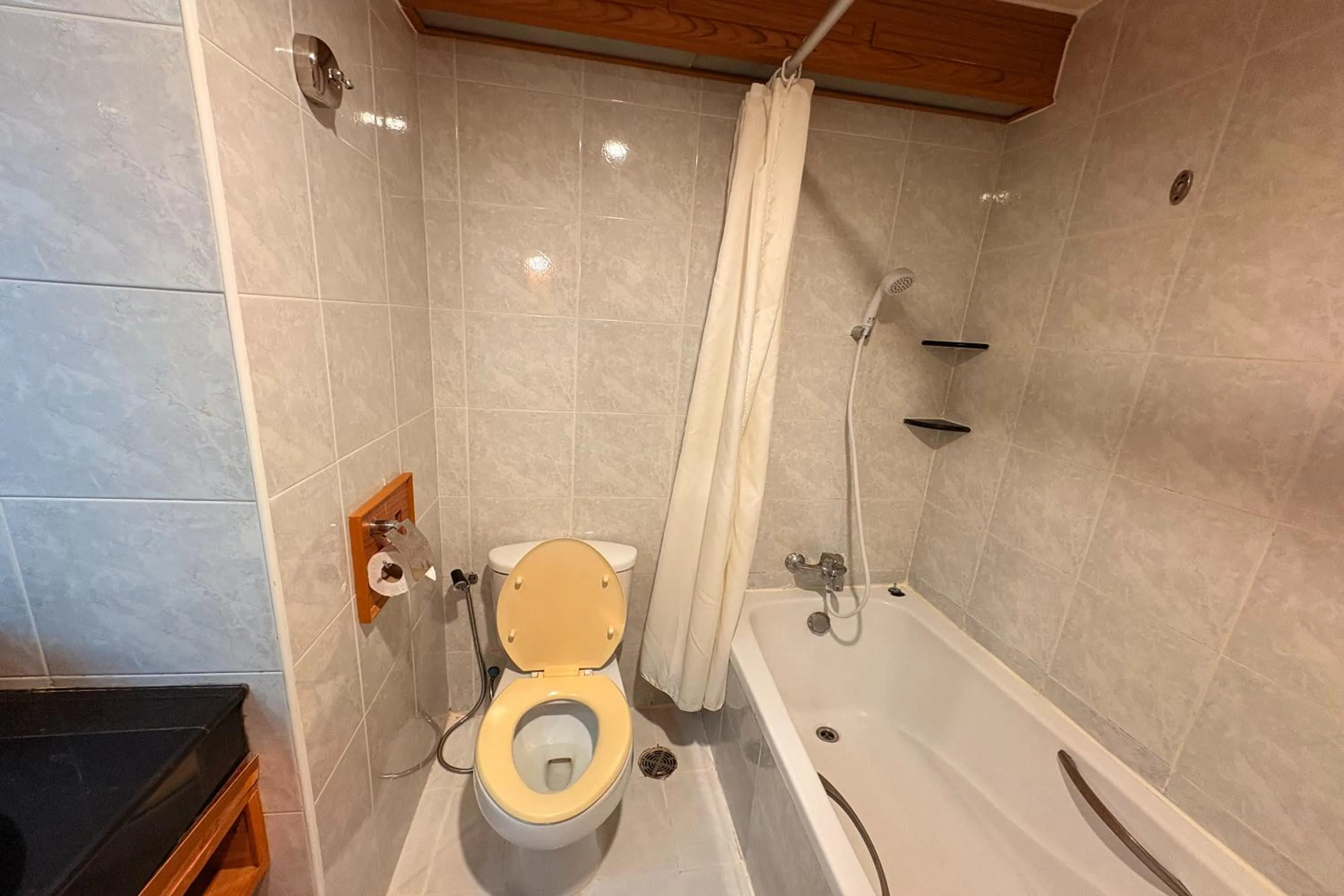 Bathroom in Taksila Hotel