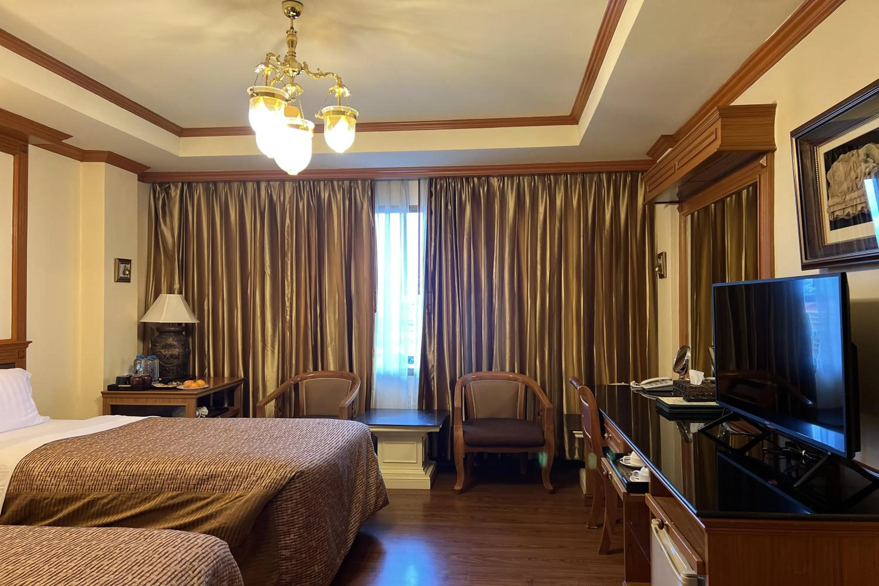 Bed in Taksila Hotel