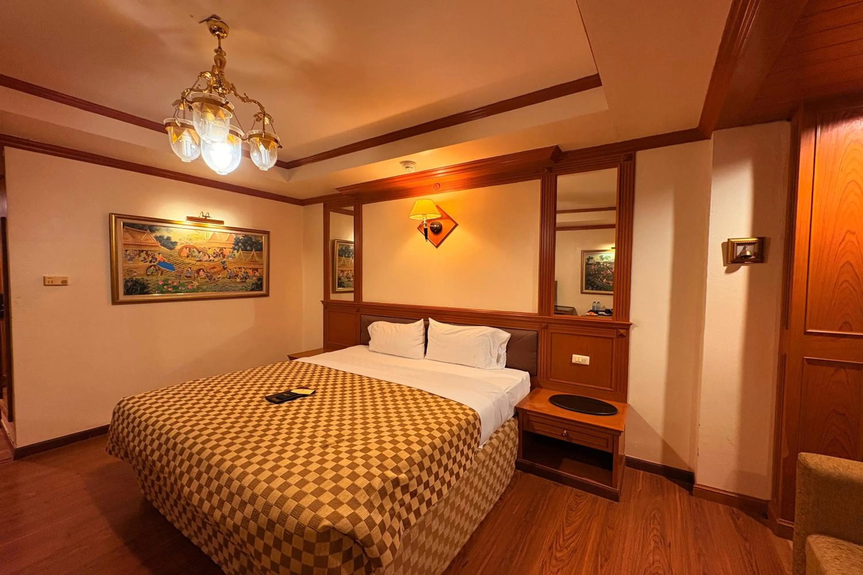 Bed in Taksila Hotel