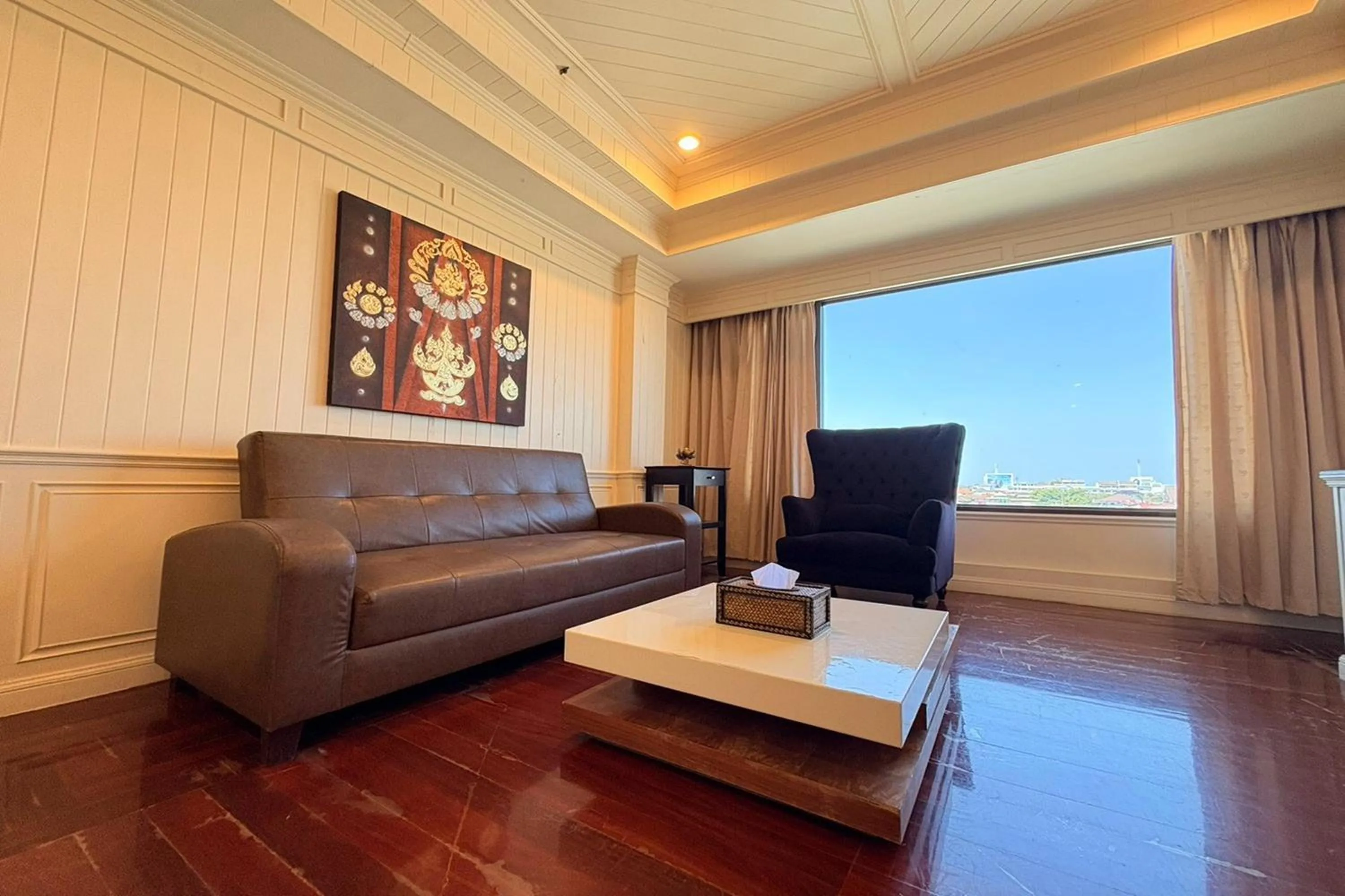 Living room in Taksila Hotel