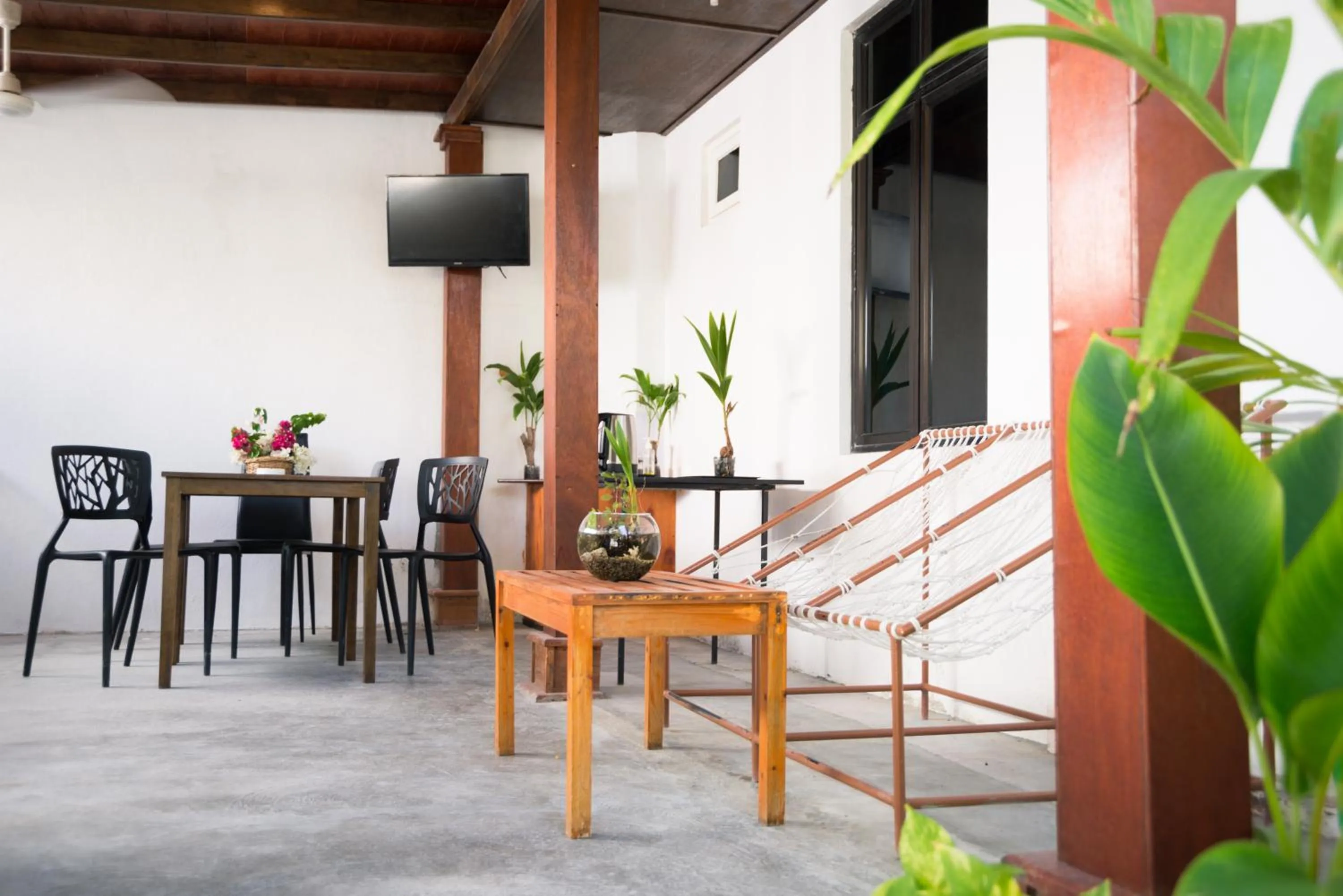 Communal lounge/ TV room in Palm Gate Maldives