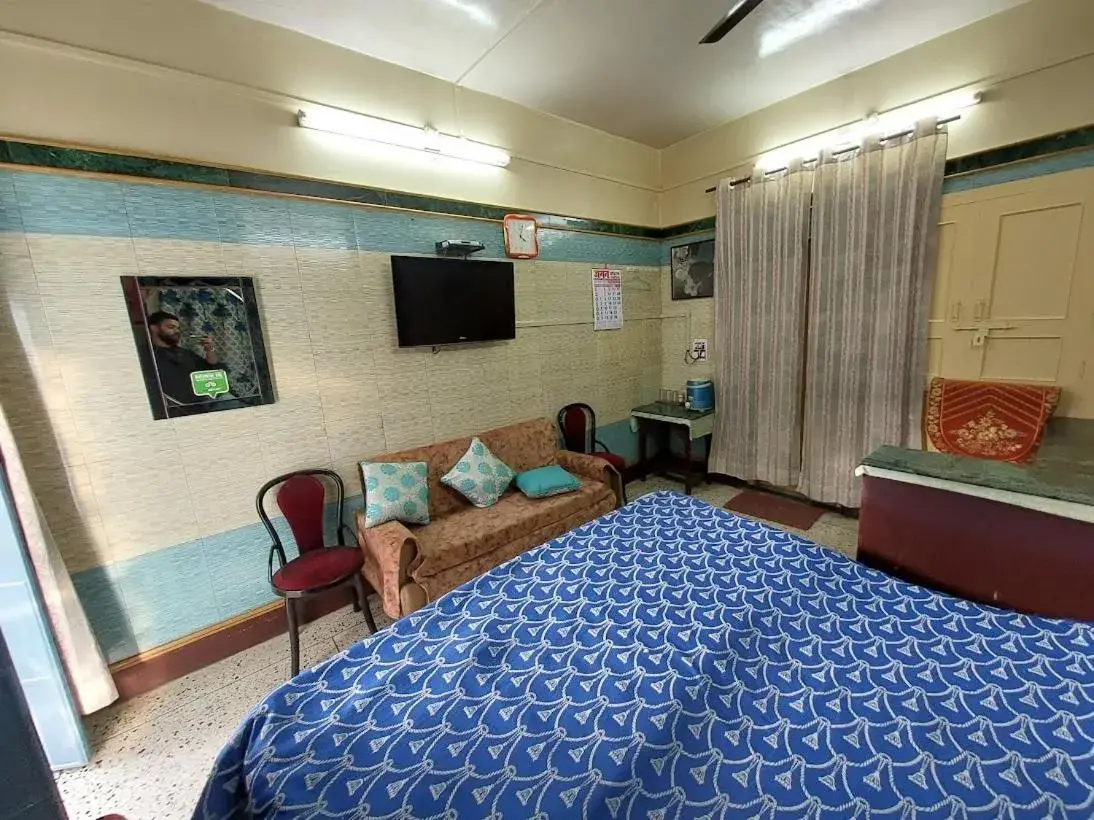 Photo of the whole room, Bed in Jagan Hotel & Restaurant Photo of the whole room, Bed in Jagan Hotel & Restaurant