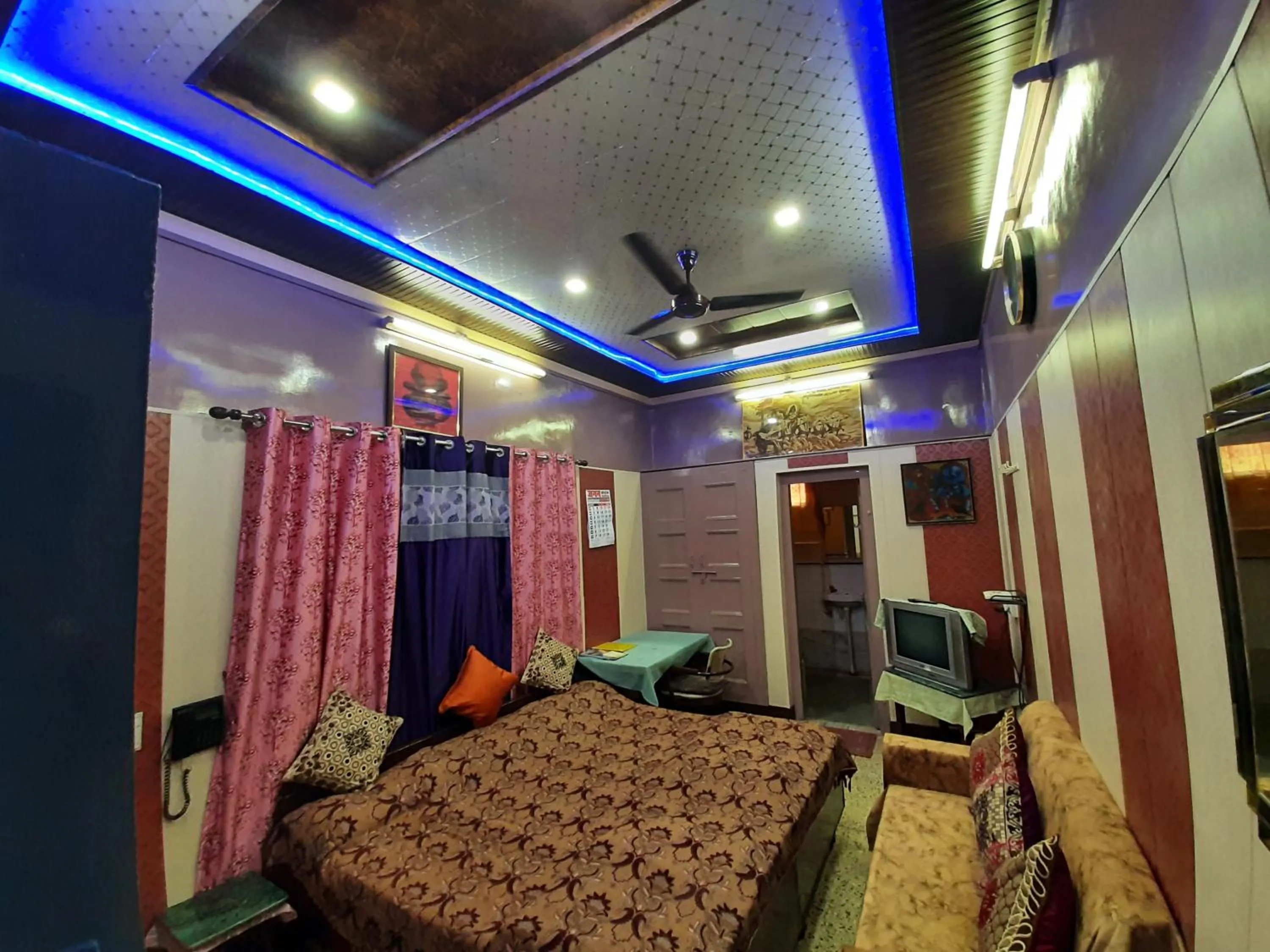 Photo of the whole room, Bed in Jagan Hotel & Restaurant