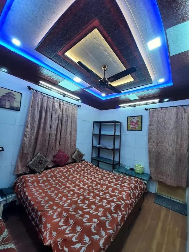 Photo of the whole room, Bed in Jagan Hotel & Restaurant