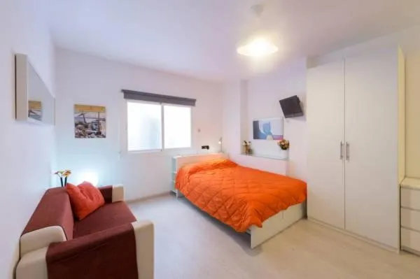 Bed in Marbel Apartments
