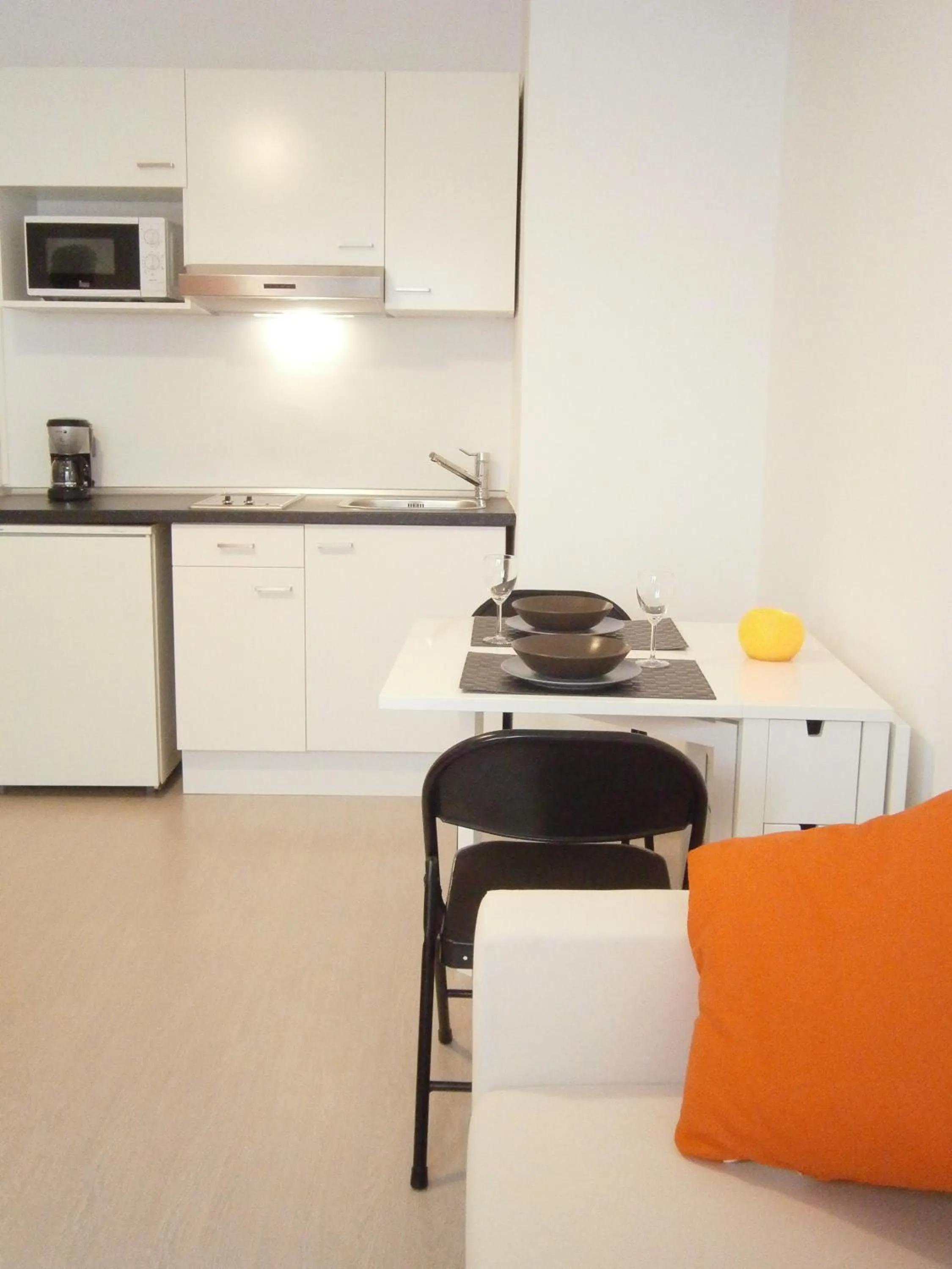 Kitchen or kitchenette in Marbel Apartments
