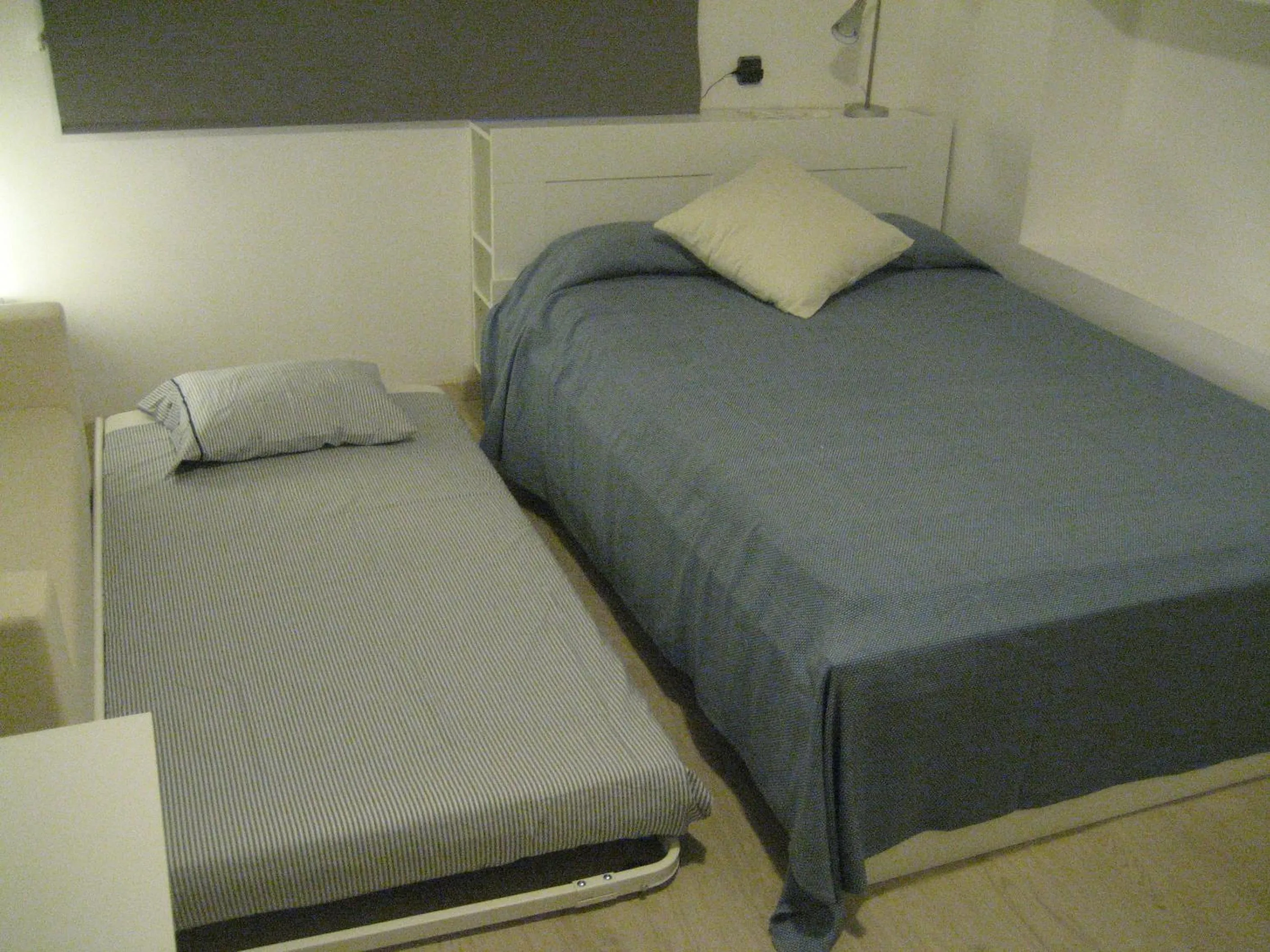 Bed in Marbel Apartments