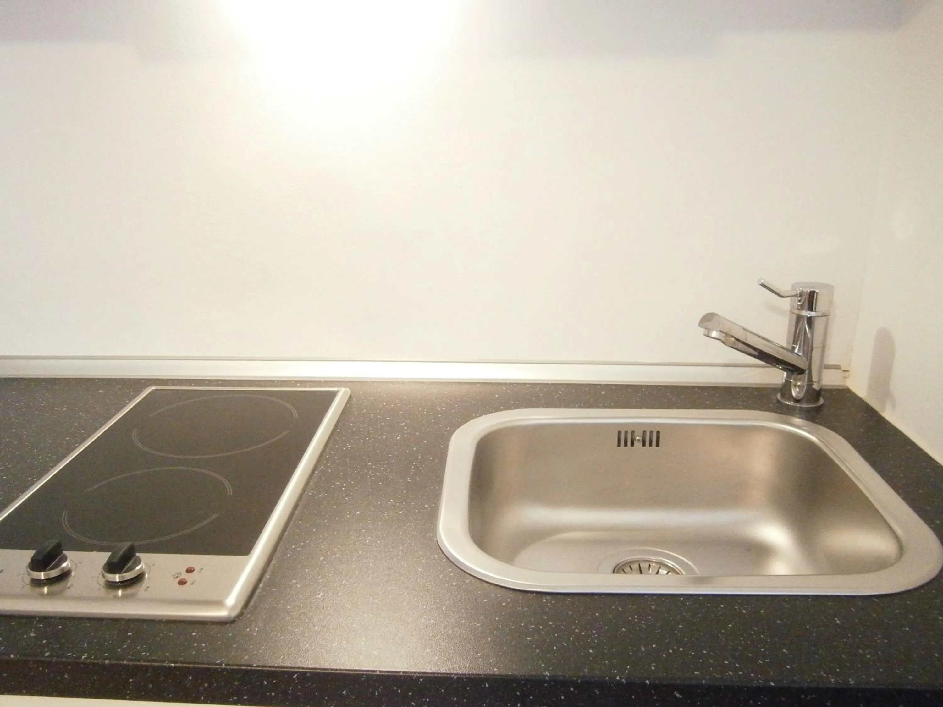 Kitchen or kitchenette in Marbel Apartments