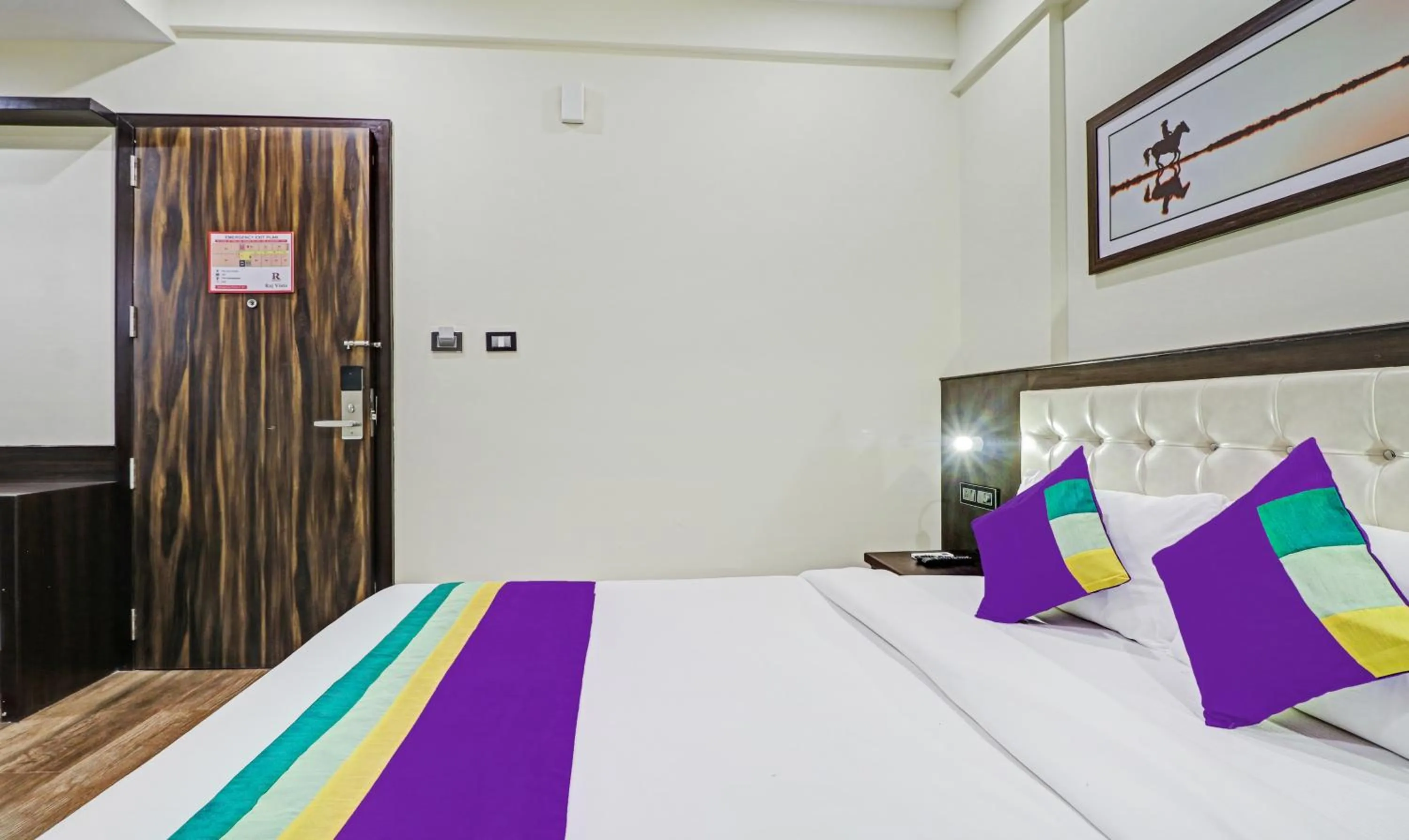 Bedroom, Bed in Treebo Premium Raj Vista Global Village