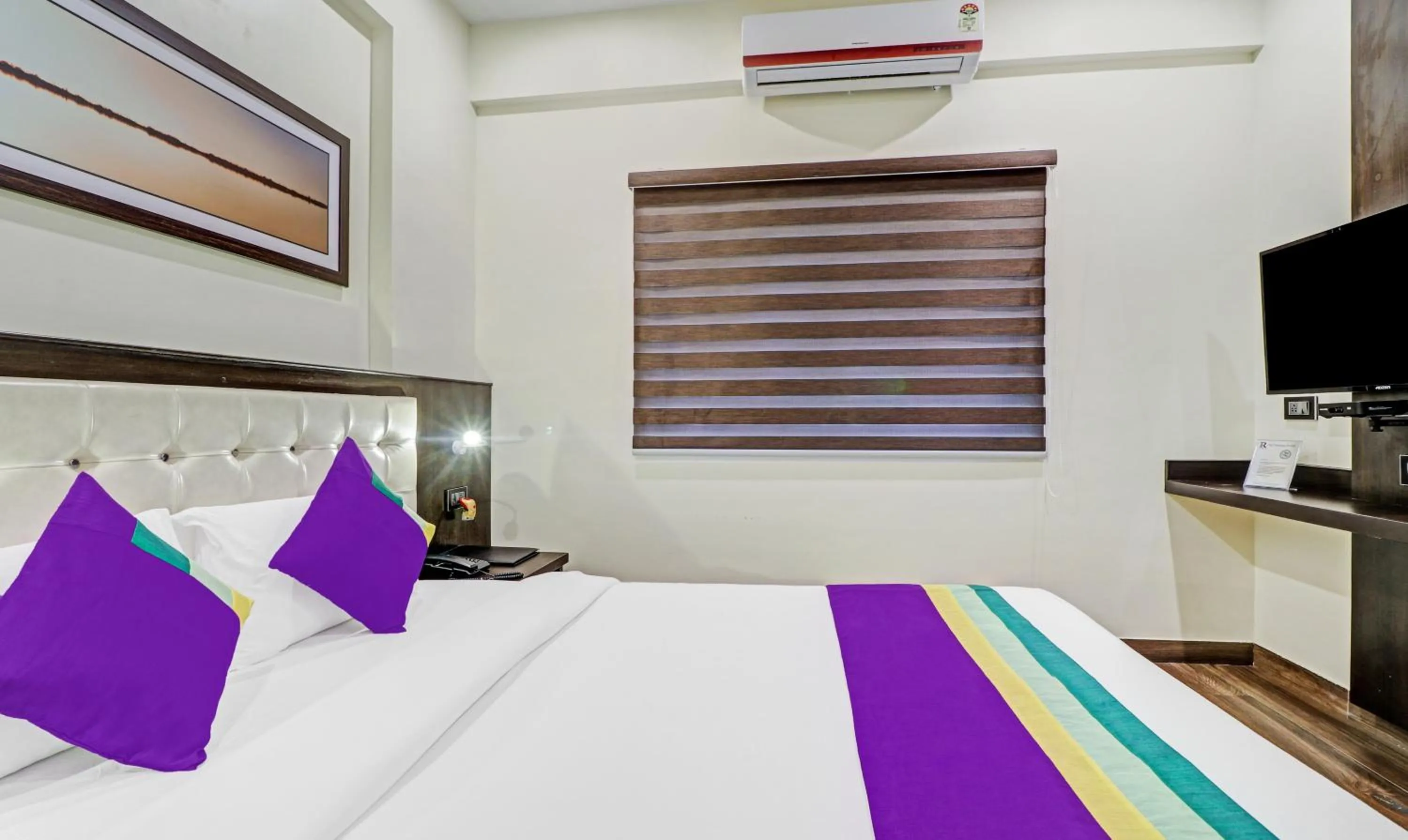 Bedroom, Bed in Treebo Premium Raj Vista Global Village