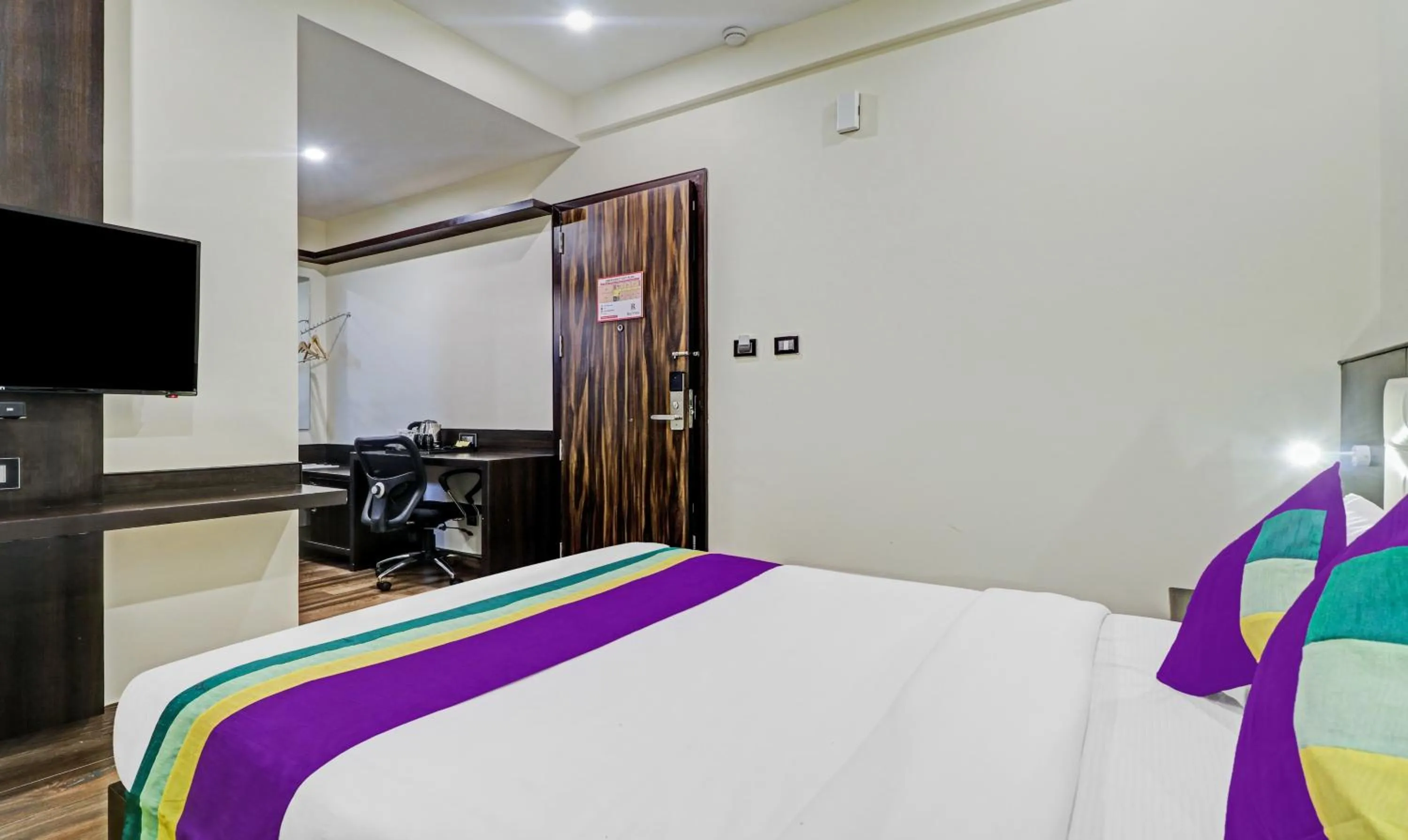 Bedroom, Bed in Treebo Premium Raj Vista Global Village