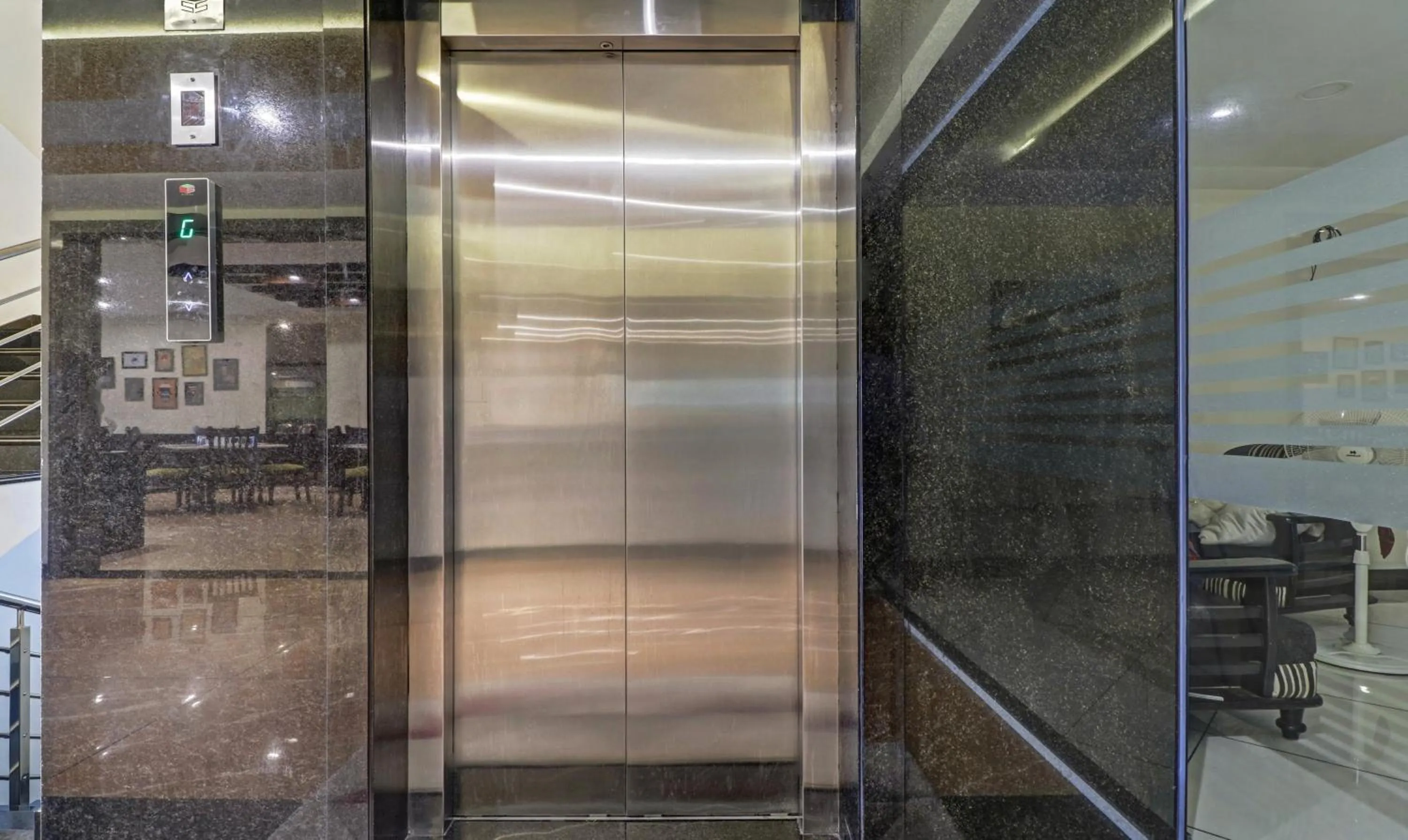 elevator in Treebo Premium Raj Vista Global Village