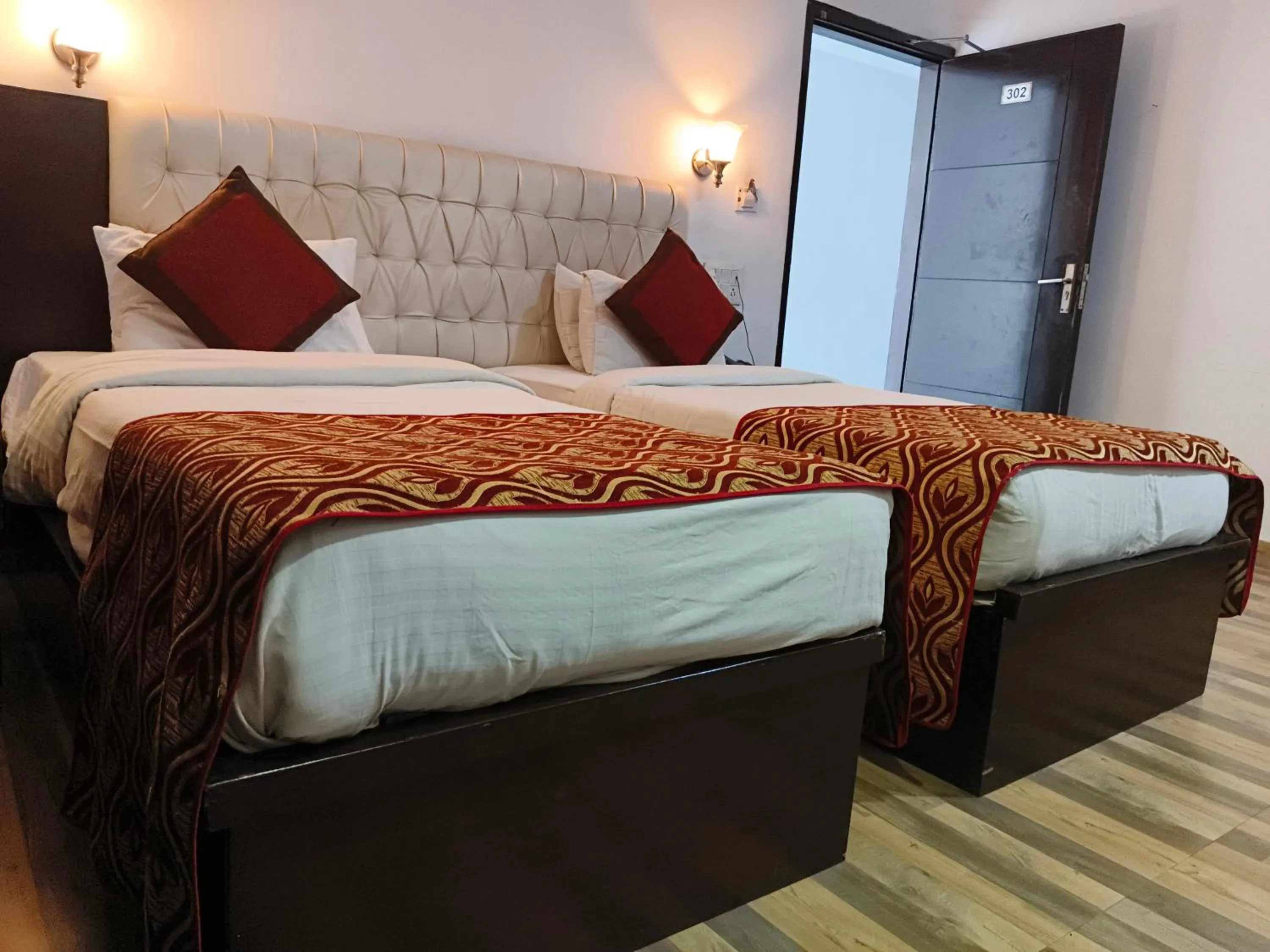 Bed in Hotel Samovar by Goyal Hoteleirs