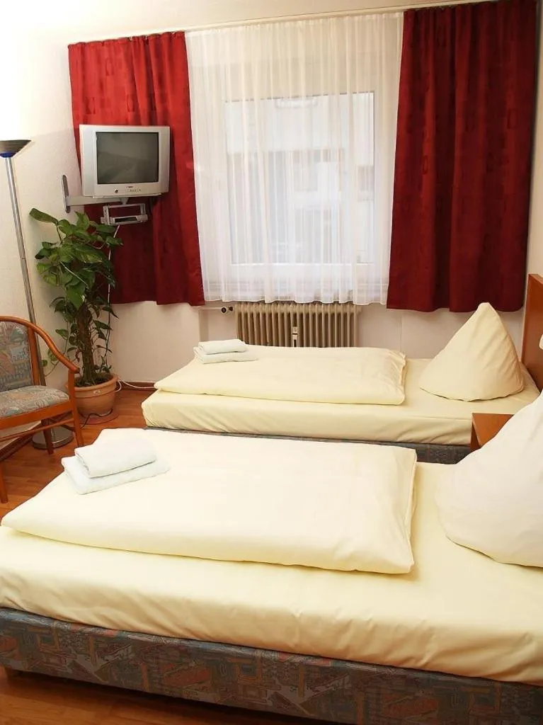 Photo of the whole room, Bed in Altstadthotel Wienecke