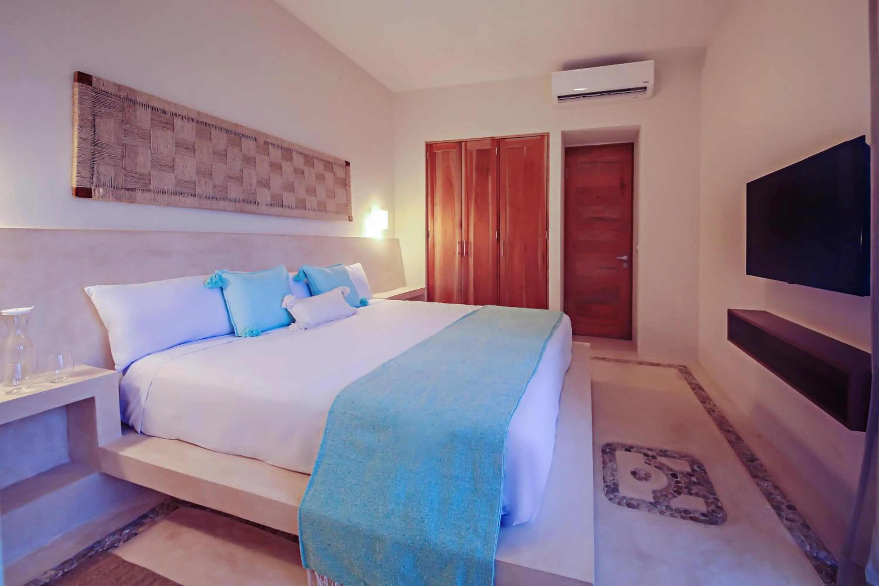 Bed in Casa Astral Eco Luxury Holbox Island - Sunset and Ocean View with Rooftop Pool