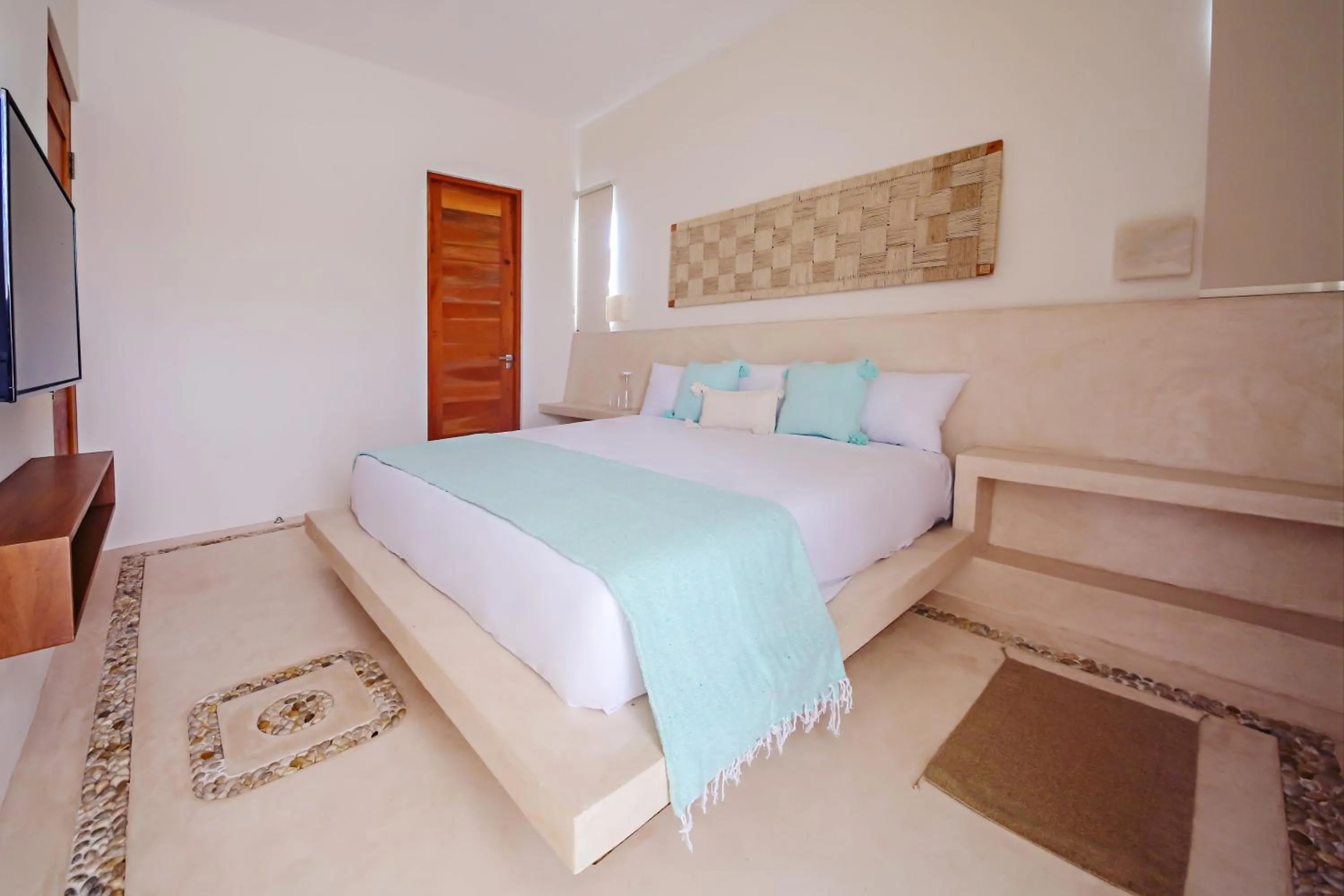 Bed in Casa Astral Eco Luxury Holbox Island - Sunset and Ocean View with Rooftop Pool