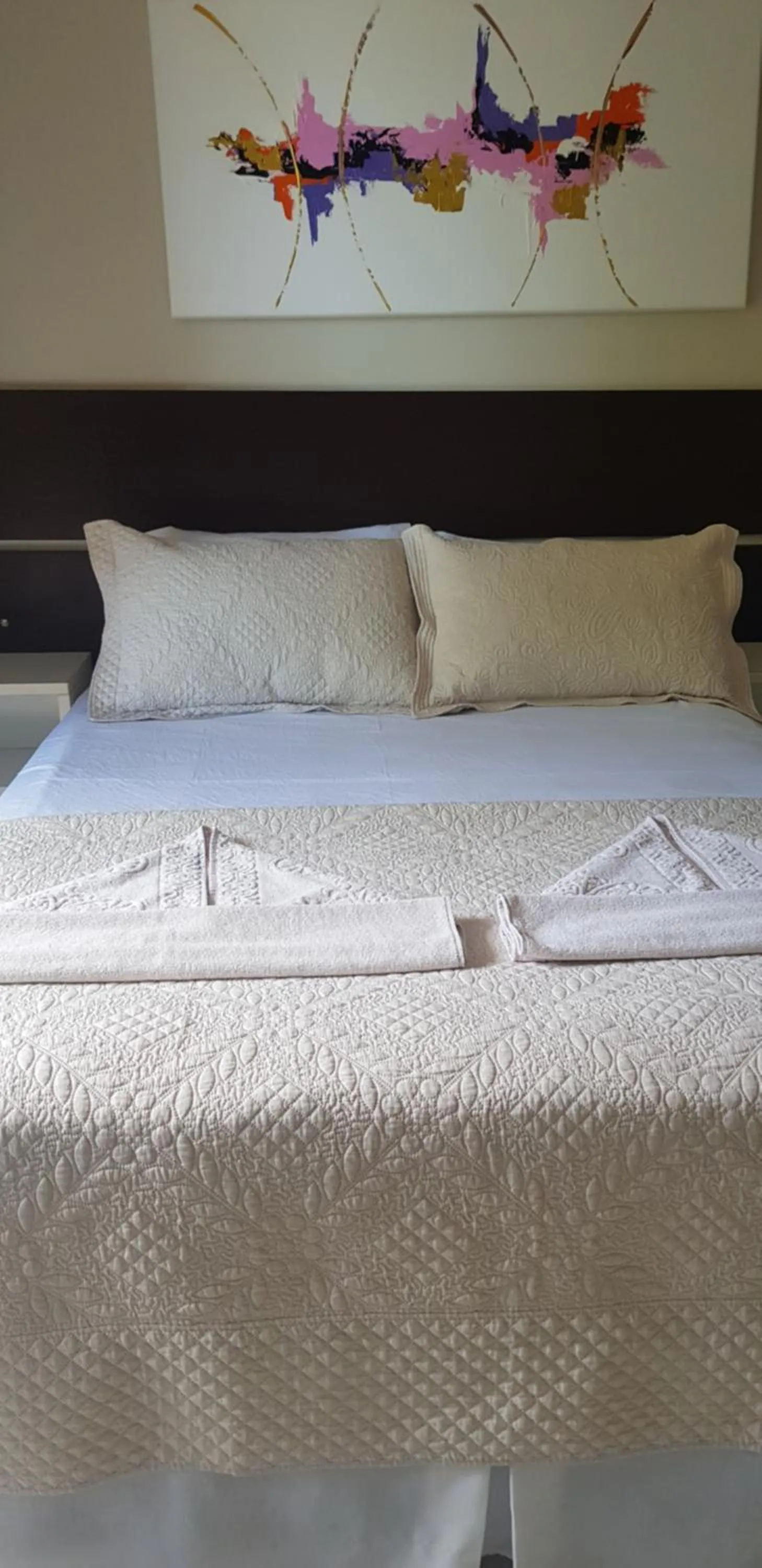 Bed in Pousada Guaruja