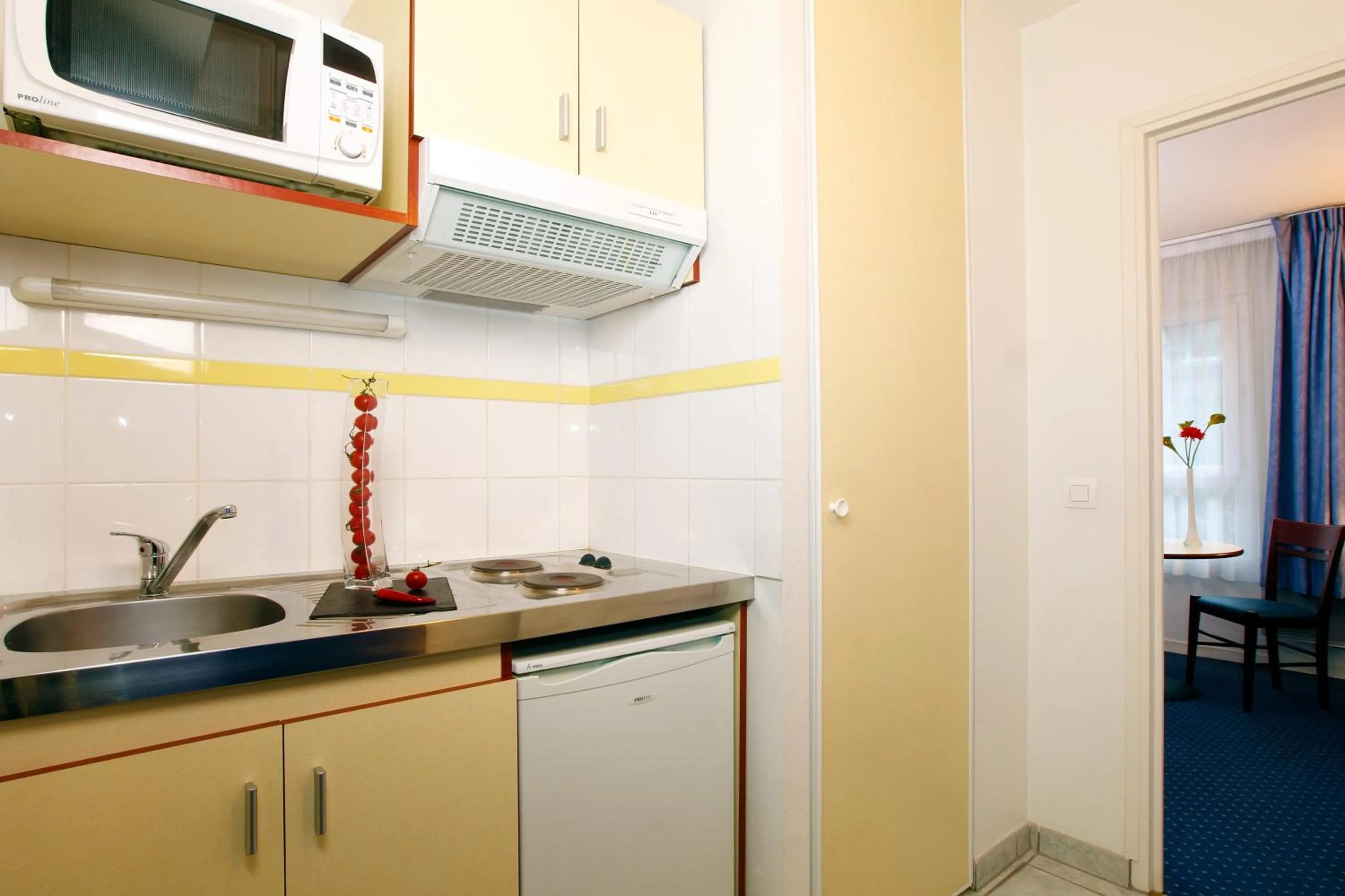 Kitchen or kitchenette in Appart'City Classic Clermont Ferrand Centre