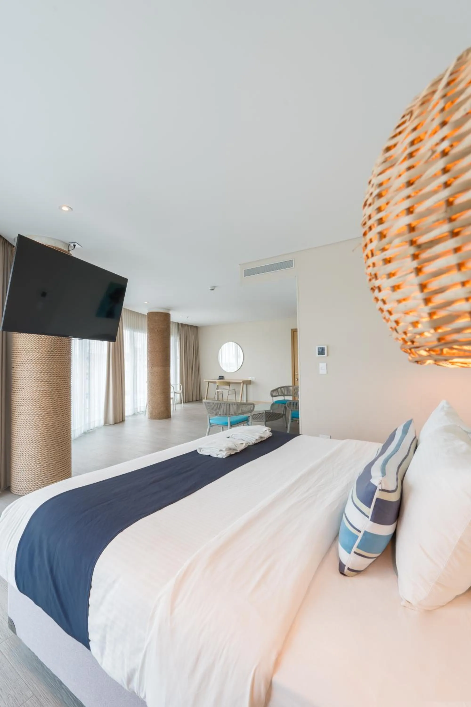 Bed in Aquamare Hotel