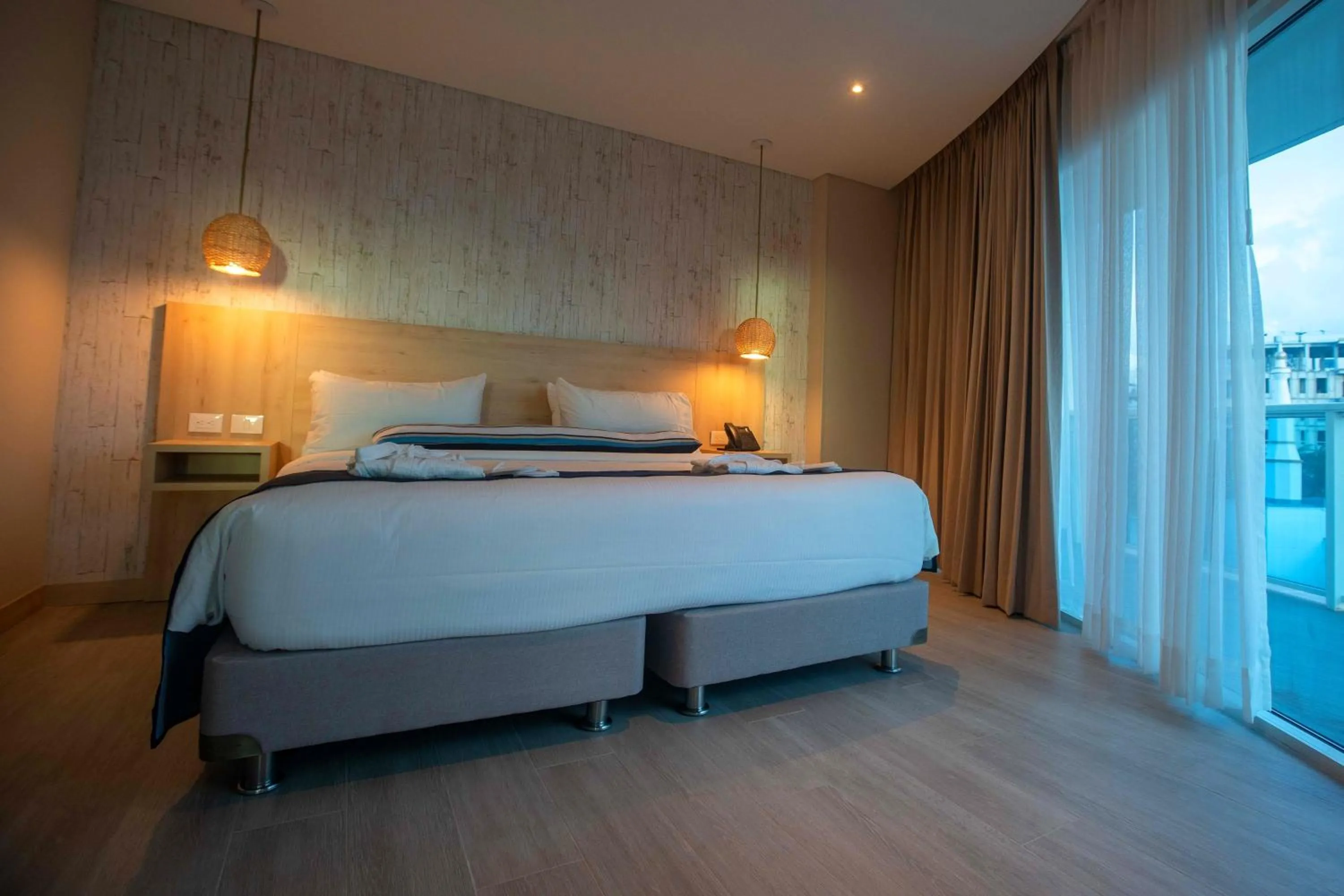 Bedroom, Bed in Aquamare Hotel