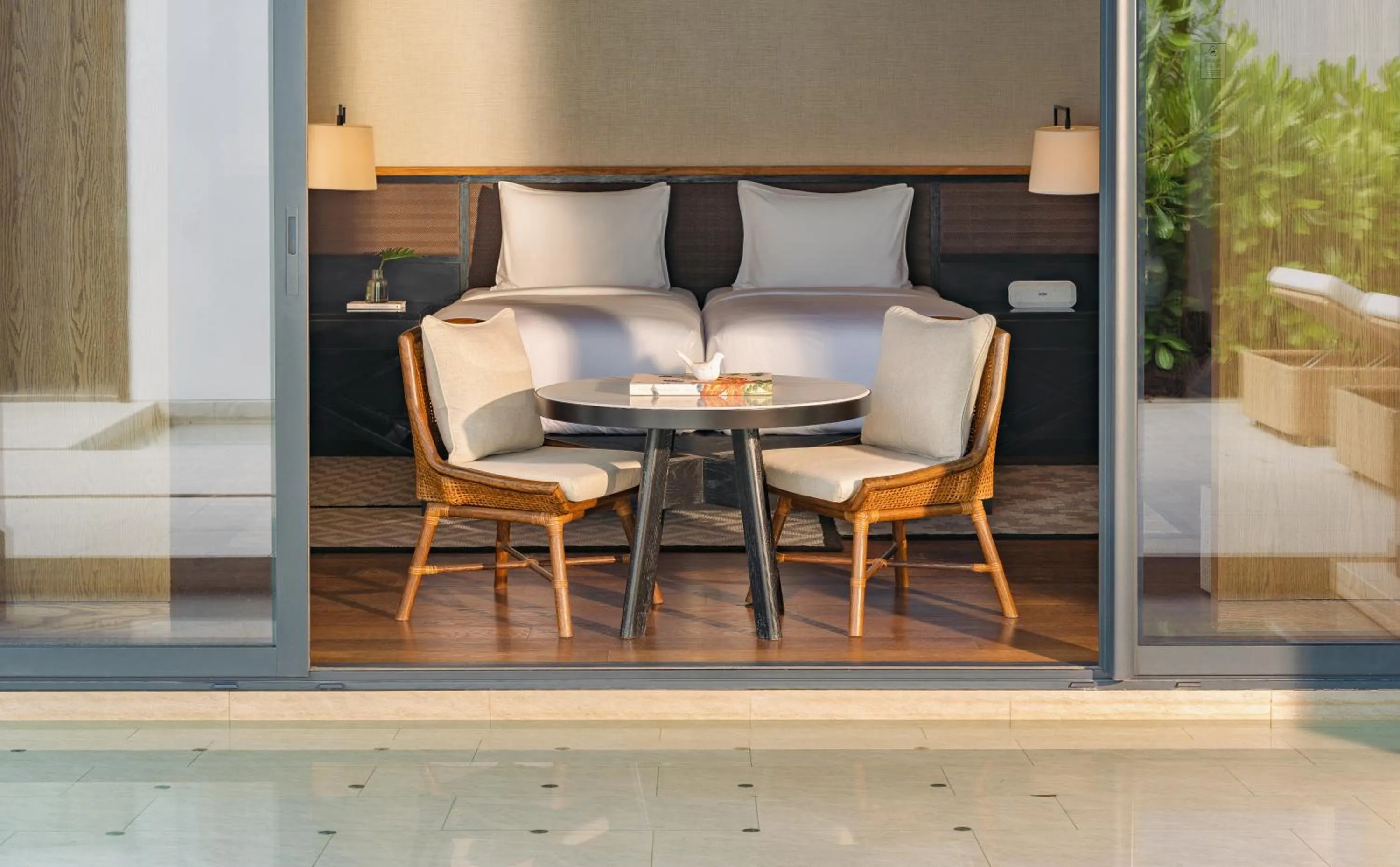 Seating area in Kimpton Kitalay Samui by IHG