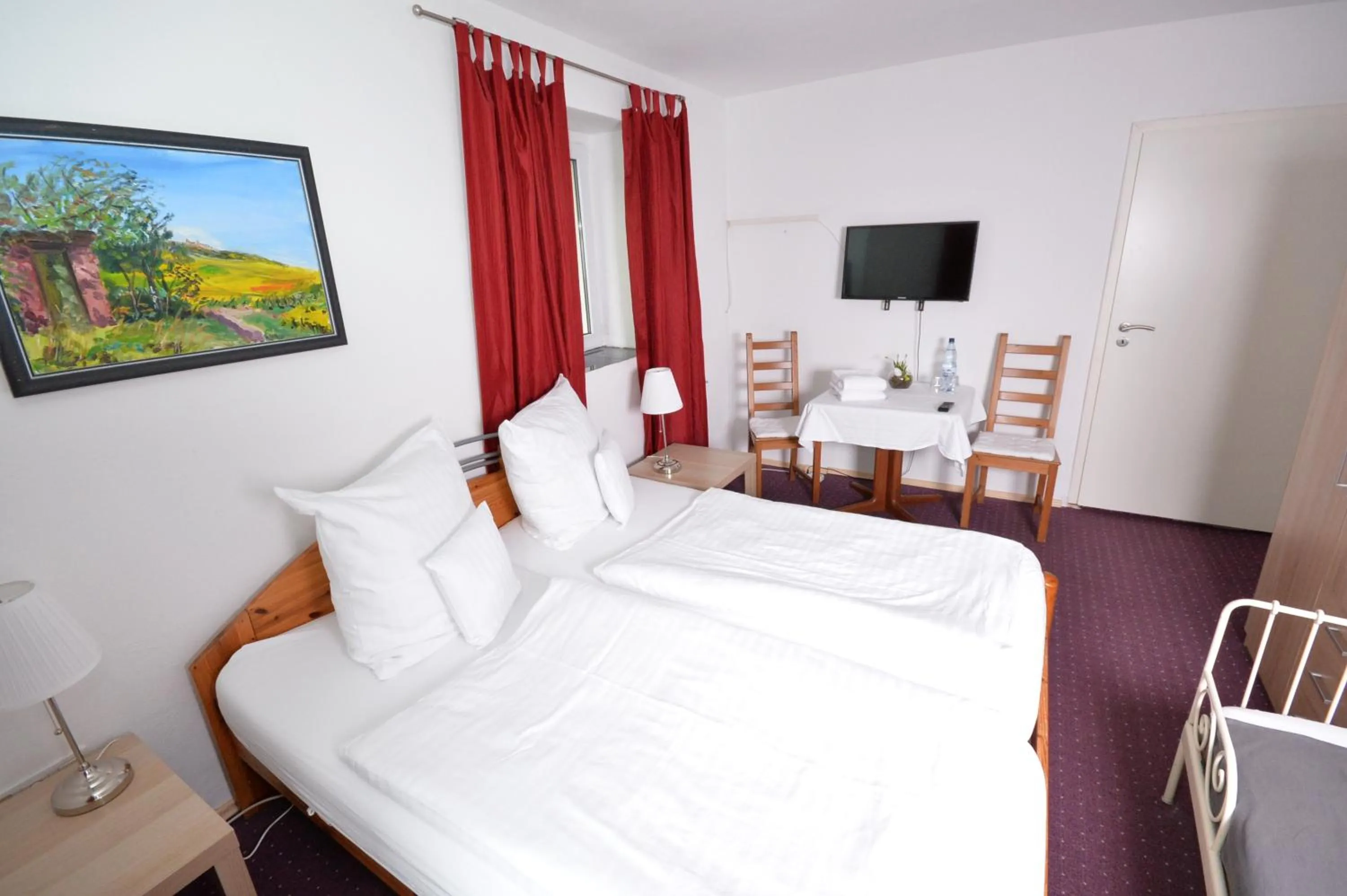 Photo of the whole room, Bed in Airportgästehaus Bremen