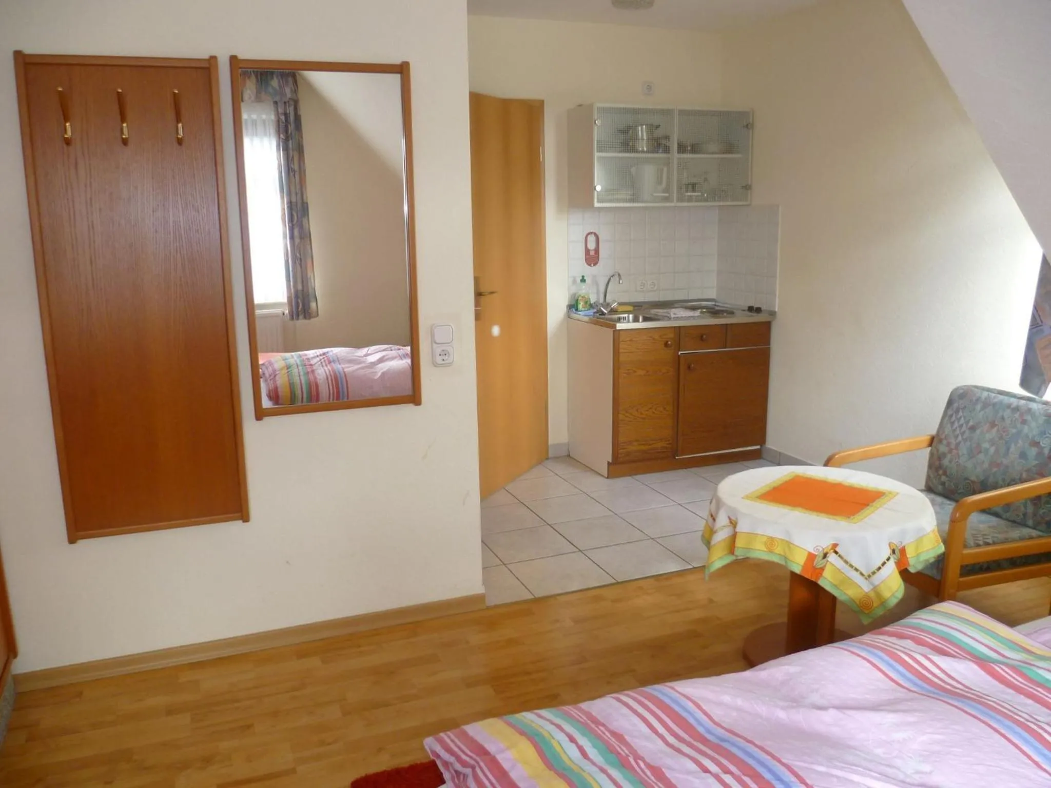 Kitchen or kitchenette, Bed in Hotel Thünenhof