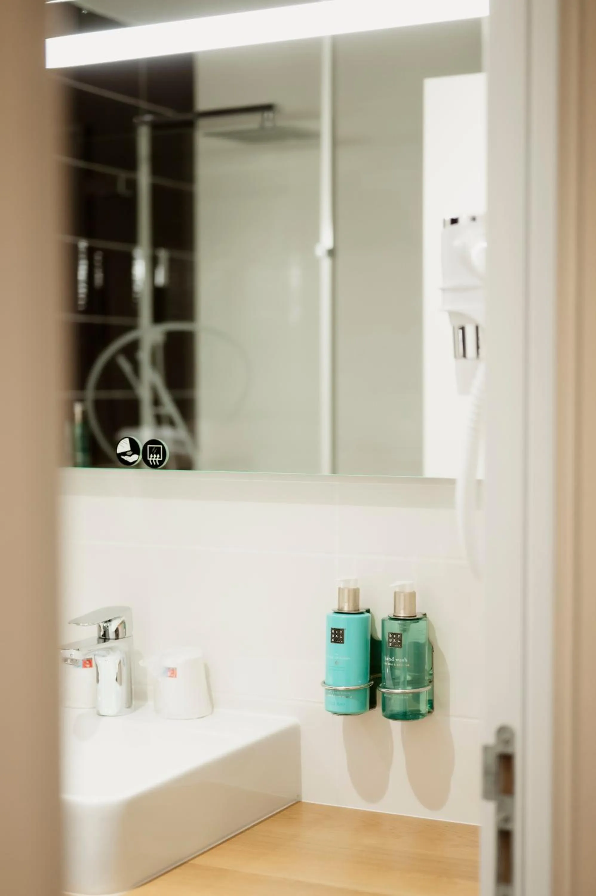 Bathroom in Hotel Dali Val d'Europe, Tapestry Collection by Hilton