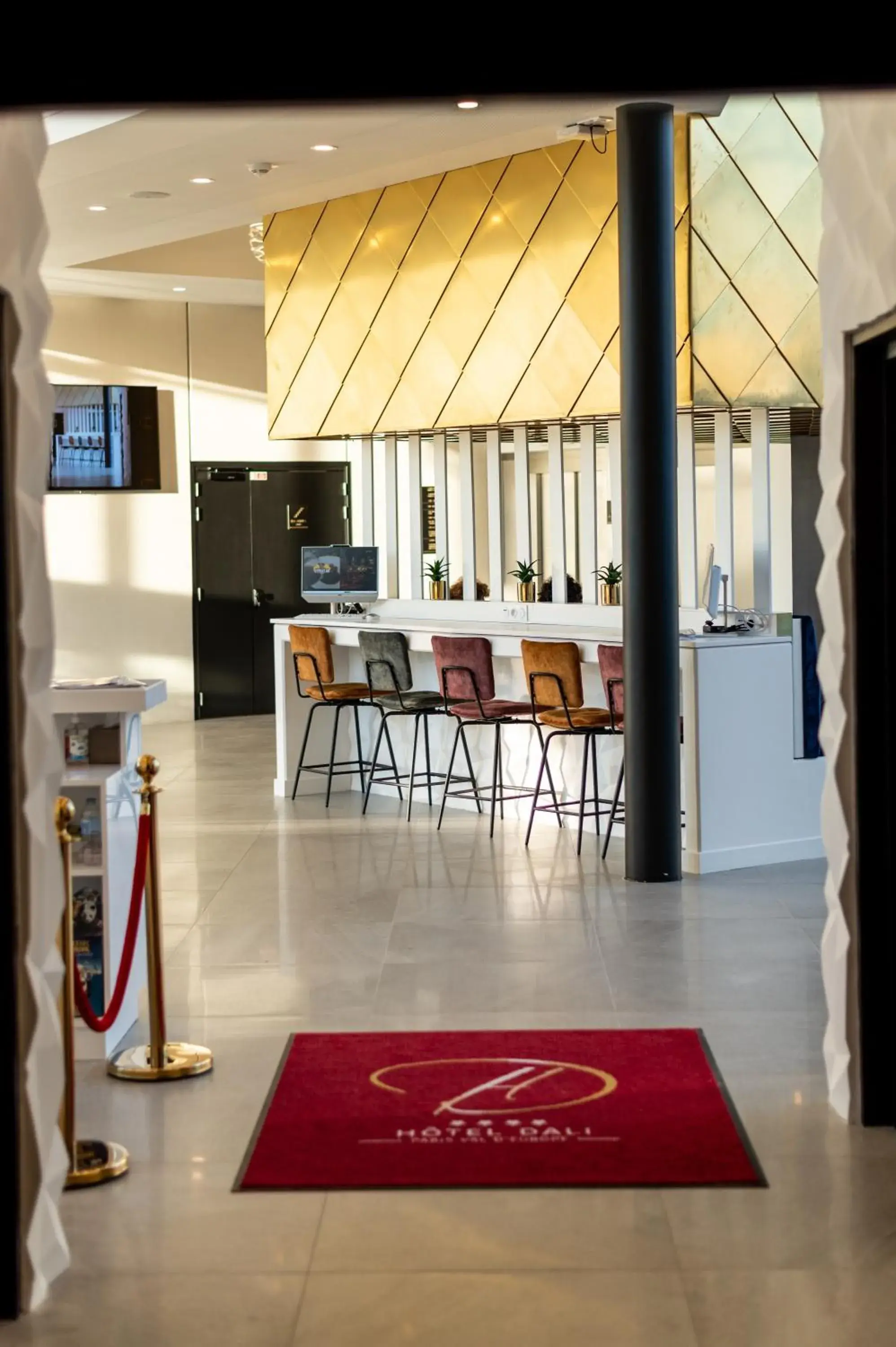 Lobby or reception in Hotel Dali Val d'Europe, Tapestry Collection by Hilton Lobby or reception in Hotel Dali Val d'Europe, Tapestry Collection by Hilton