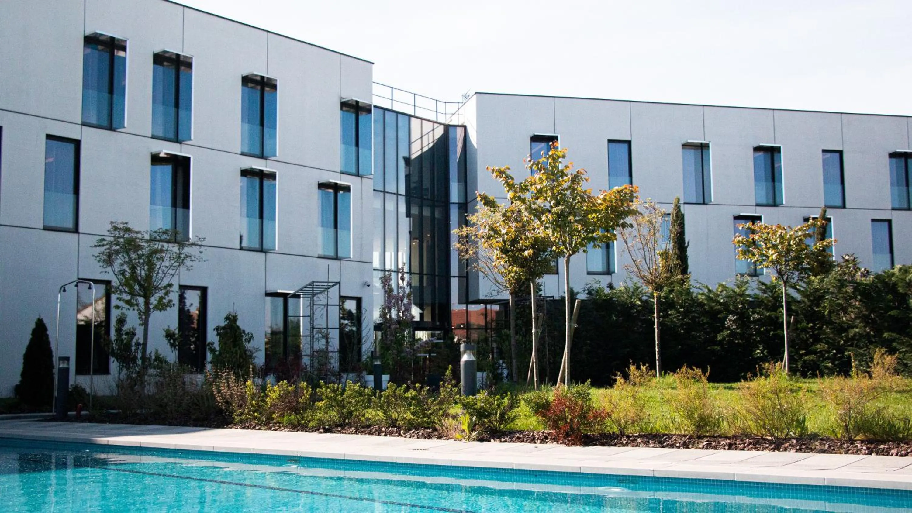 Swimming pool in Hotel Dali Val d'Europe, Tapestry Collection by Hilton