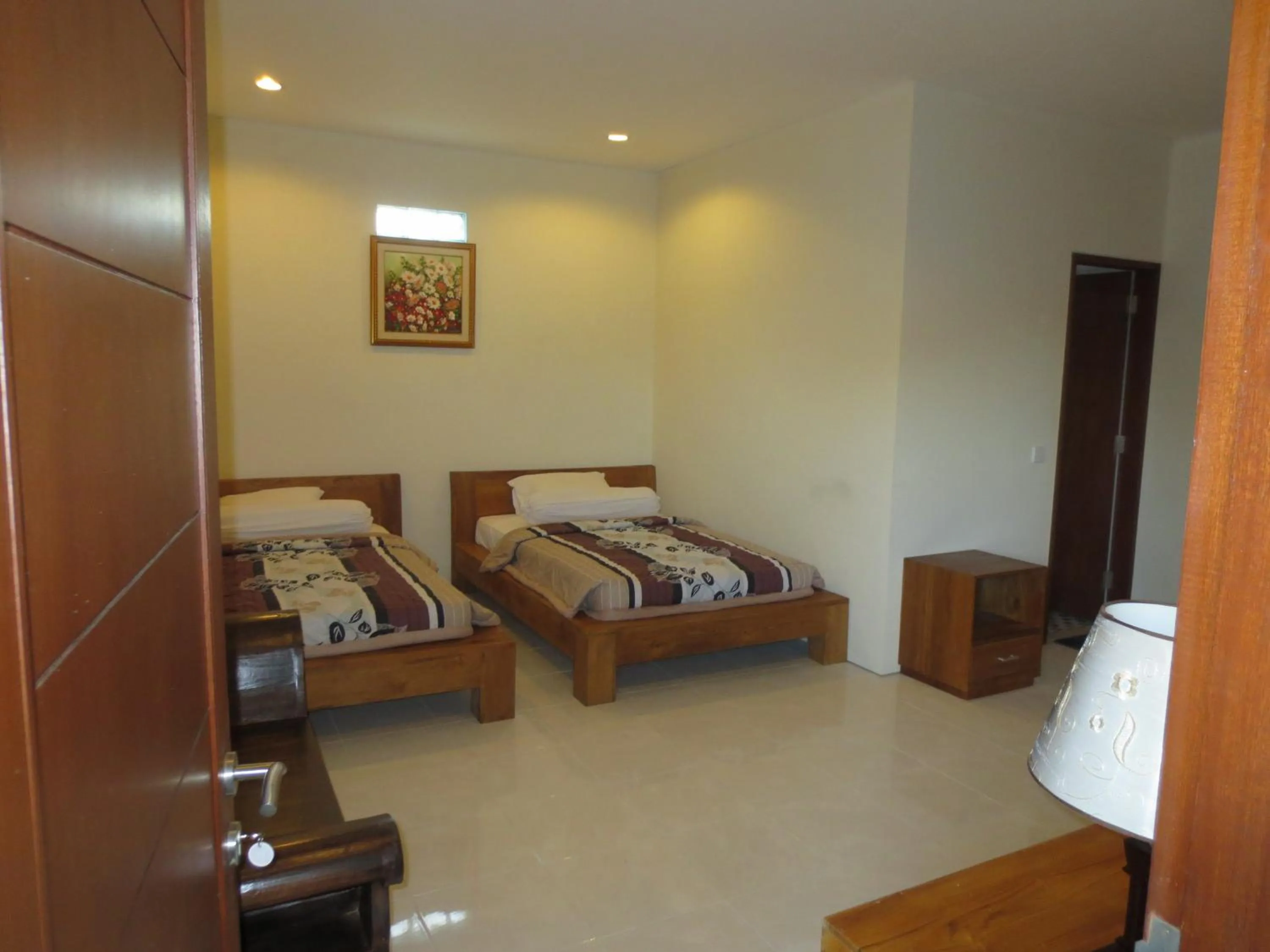 Photo of the whole room, Bed in Putri Homestay
