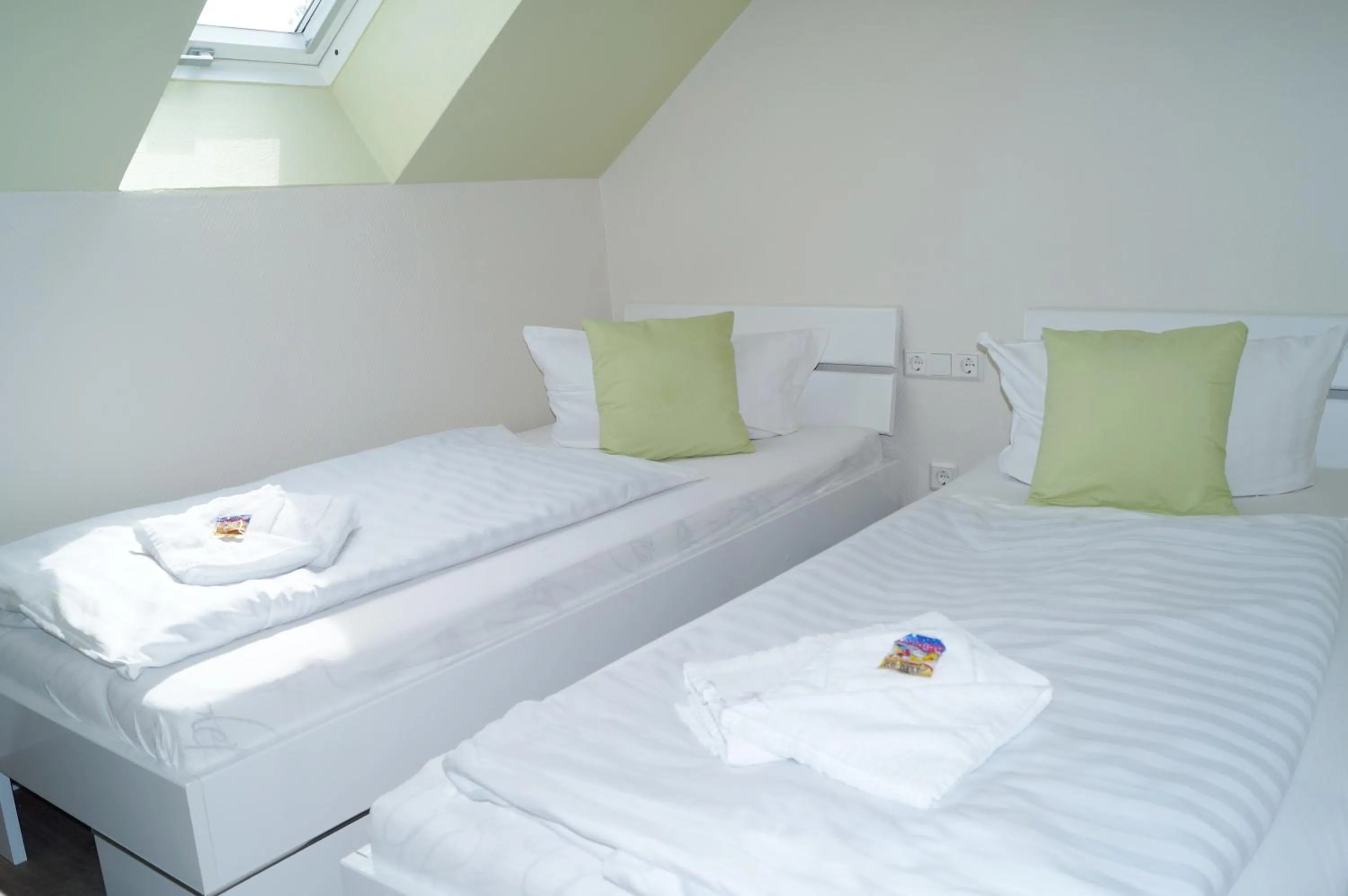 Bed in REGIOHOTEL Pfälzer Hof Wernigerode