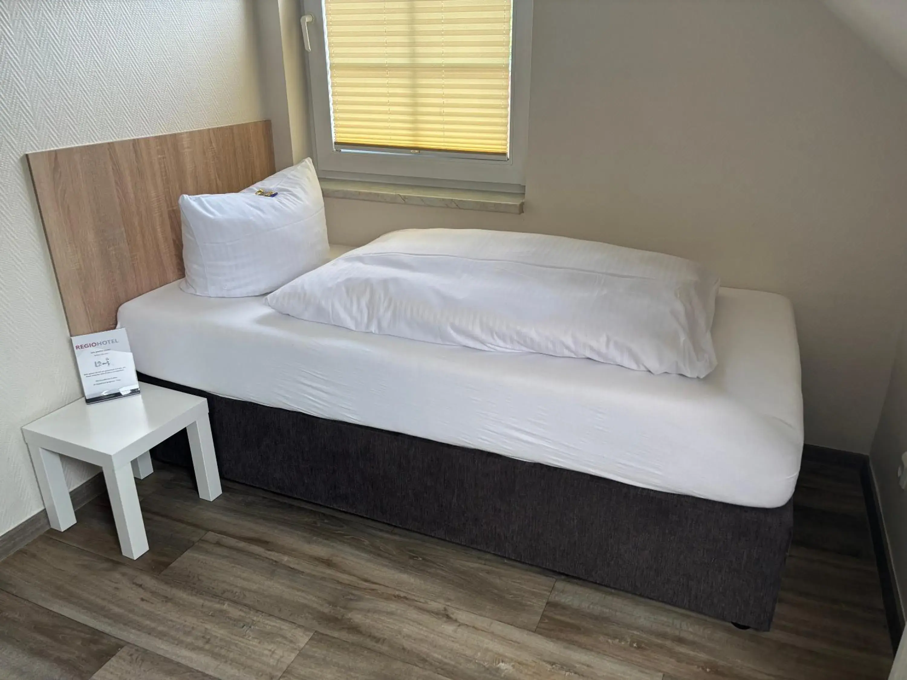 Photo of the whole room, Bed in REGIOHOTEL Pfälzer Hof Wernigerode - #Familienfreundlich #PreiswertÜbernachten #Harzurlaub #FreeParking Photo of the whole room, Bed in REGIOHOTEL Pfälzer Hof Wernigerode - #Familienfreundlich #PreiswertÜbernachten #Harzurlaub #FreeParking