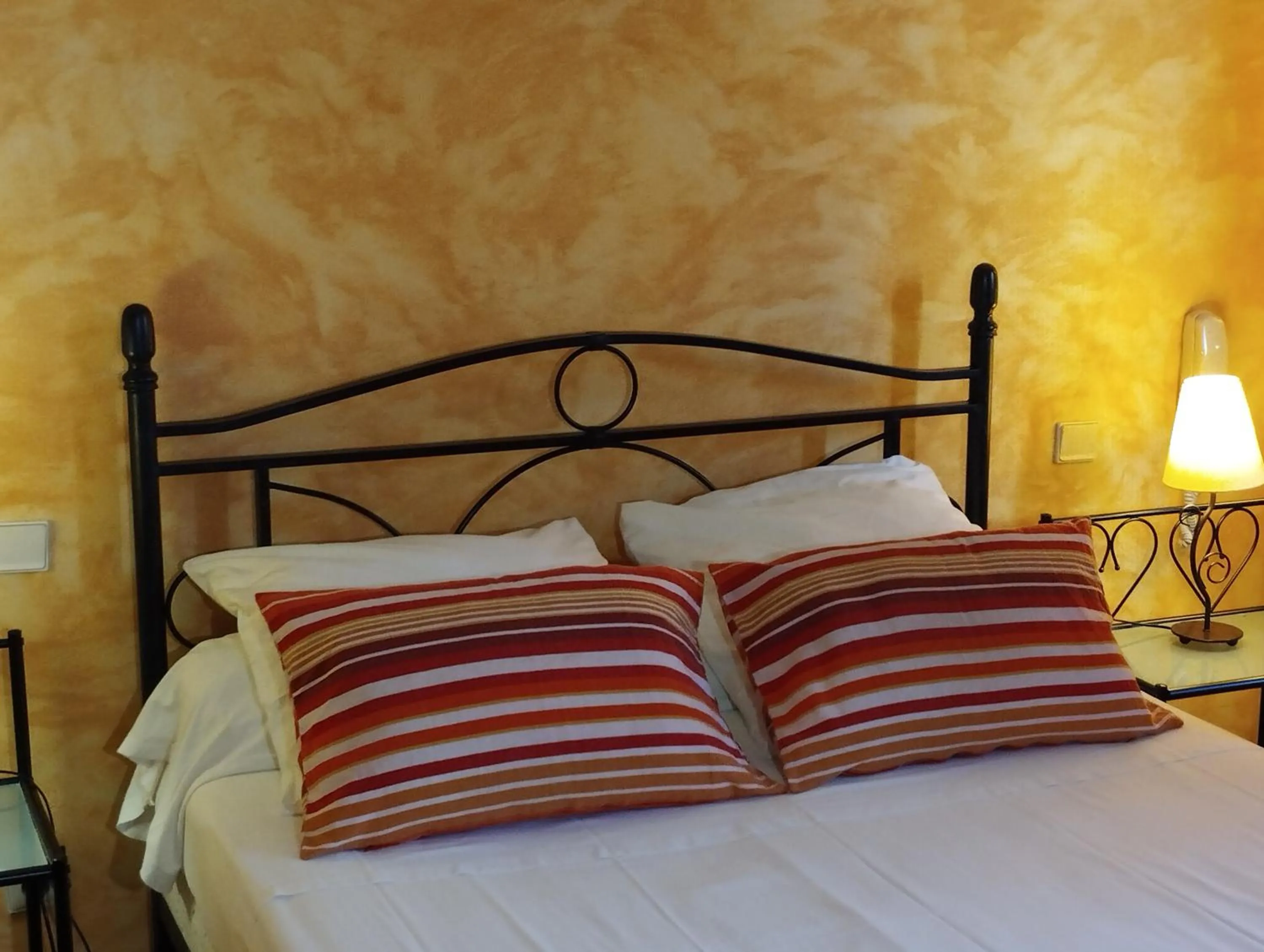 Bed in Logis Hotel Restaurant L'Esquielle