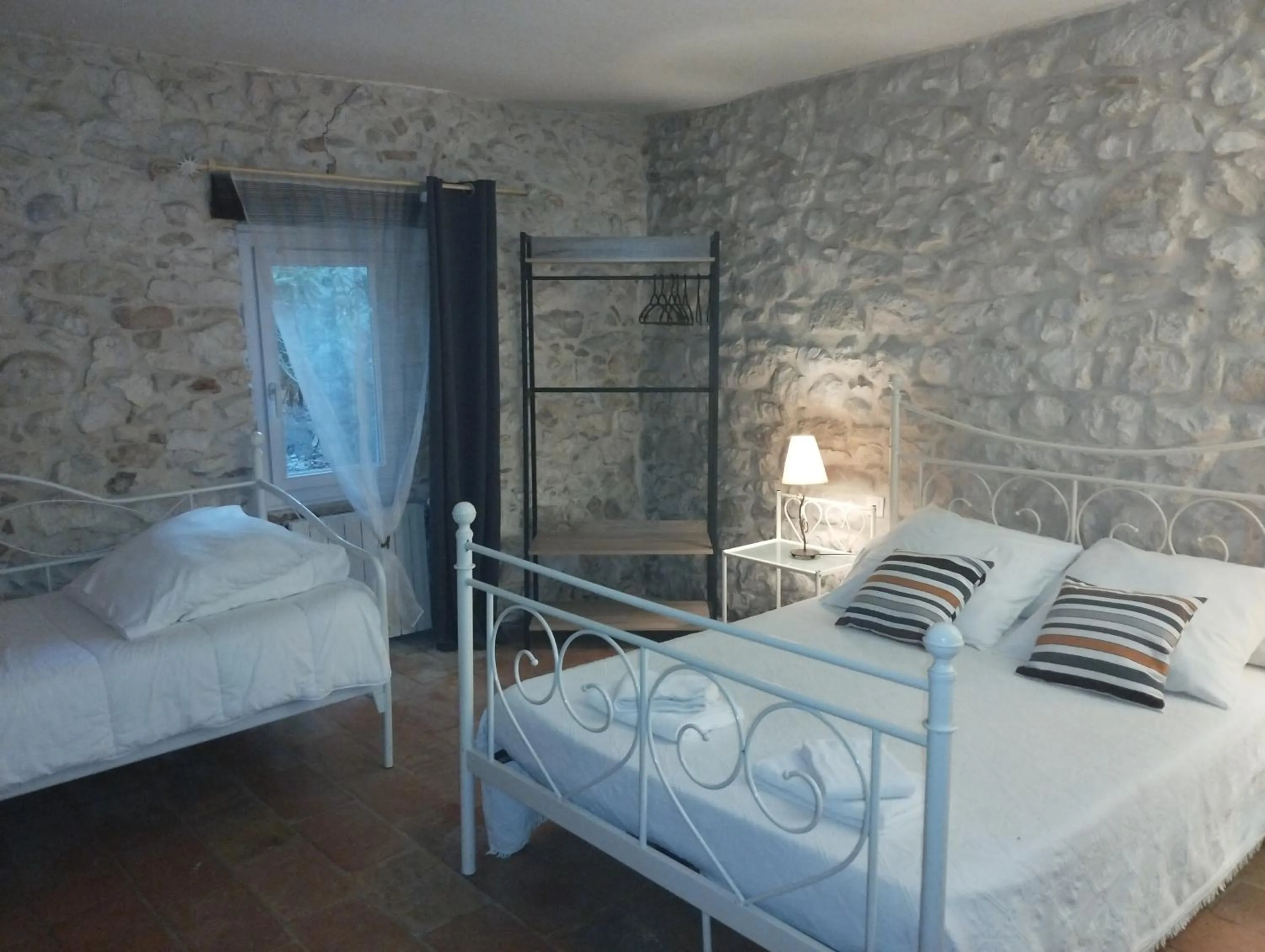 Bed in Logis Hotel Restaurant L'Esquielle