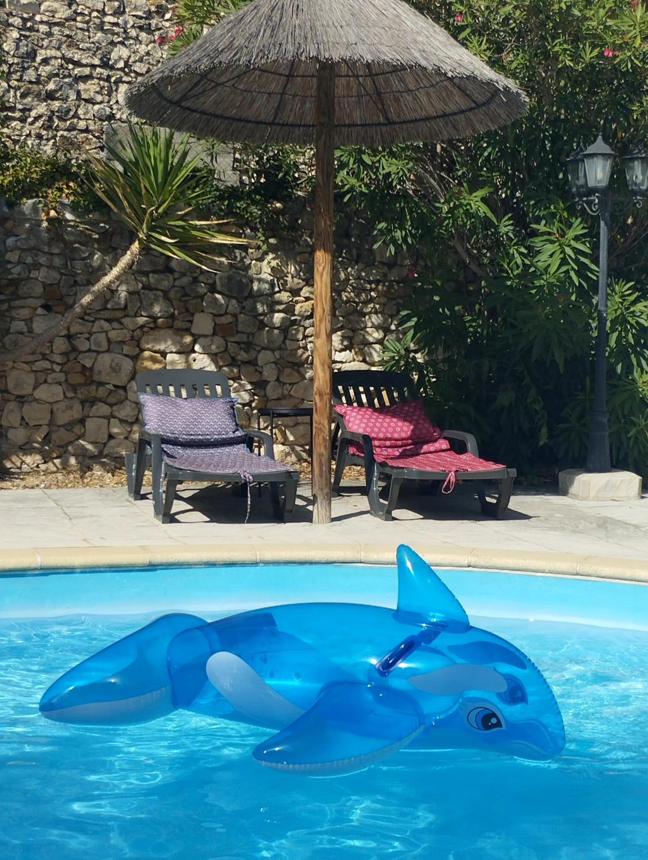 Swimming pool in Logis Hotel Restaurant L'Esquielle