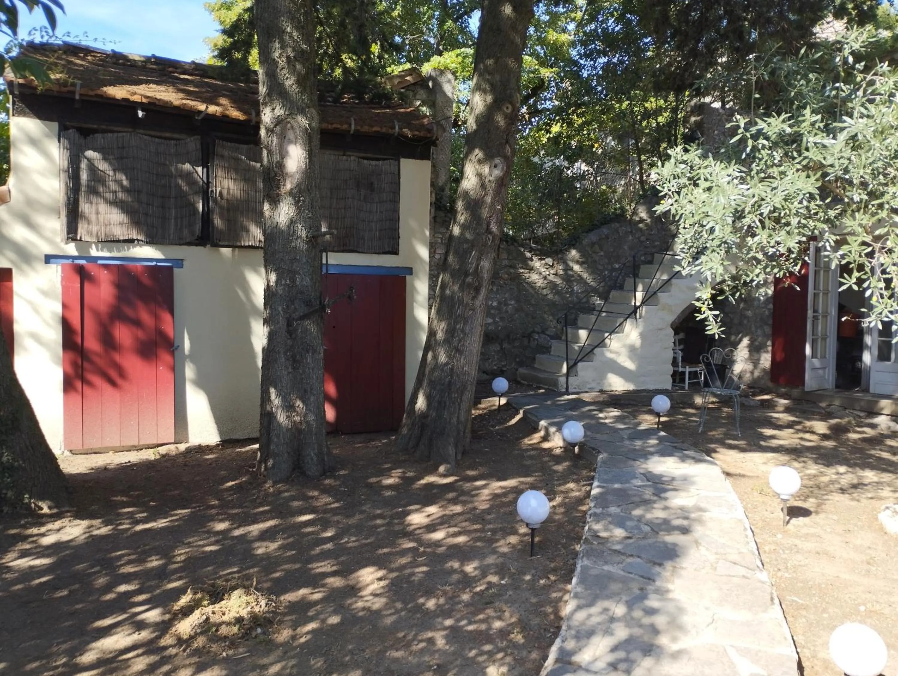 Garden in Logis Hotel Restaurant L'Esquielle