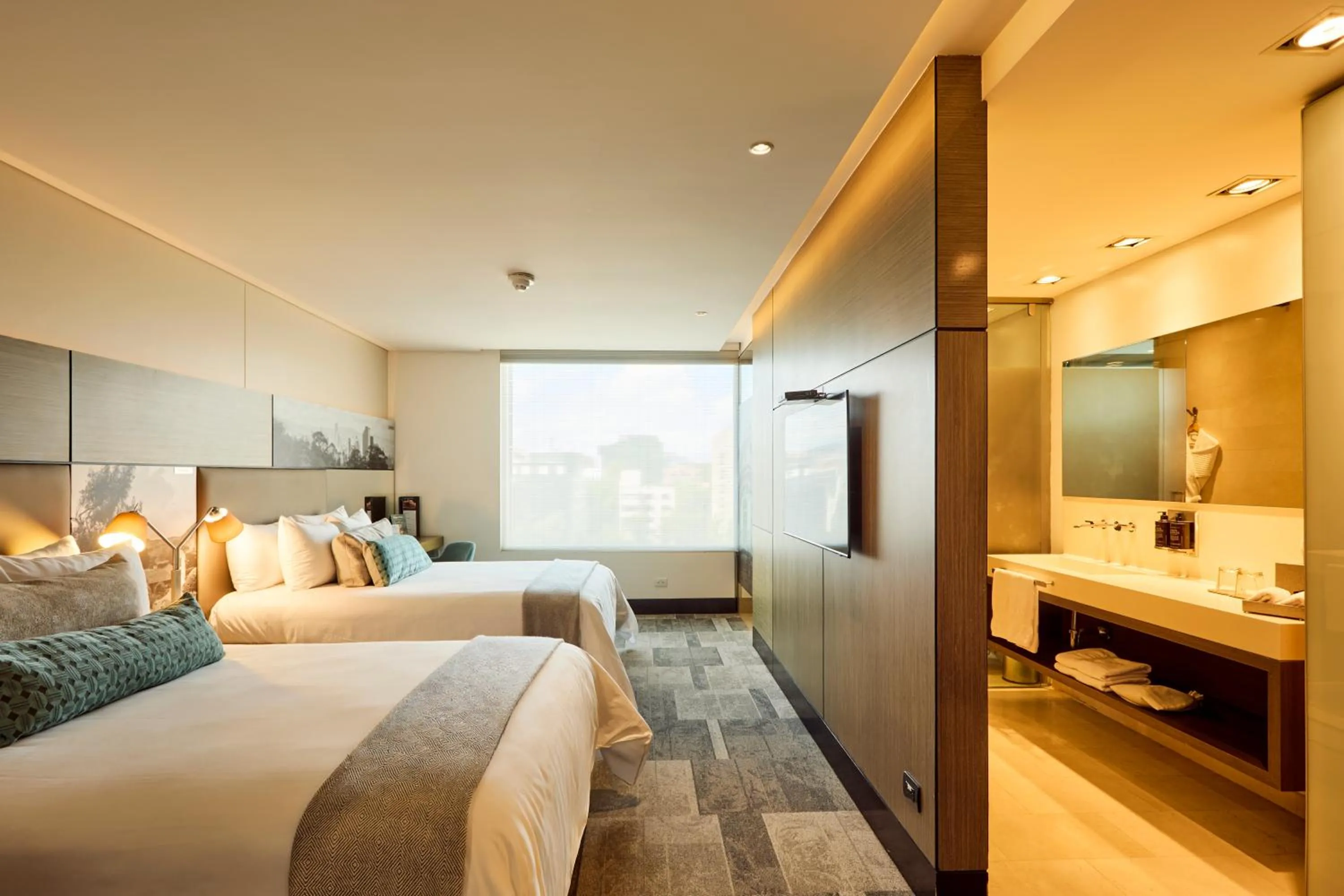 Bed in EK Hotel By Preferred Hotels Group