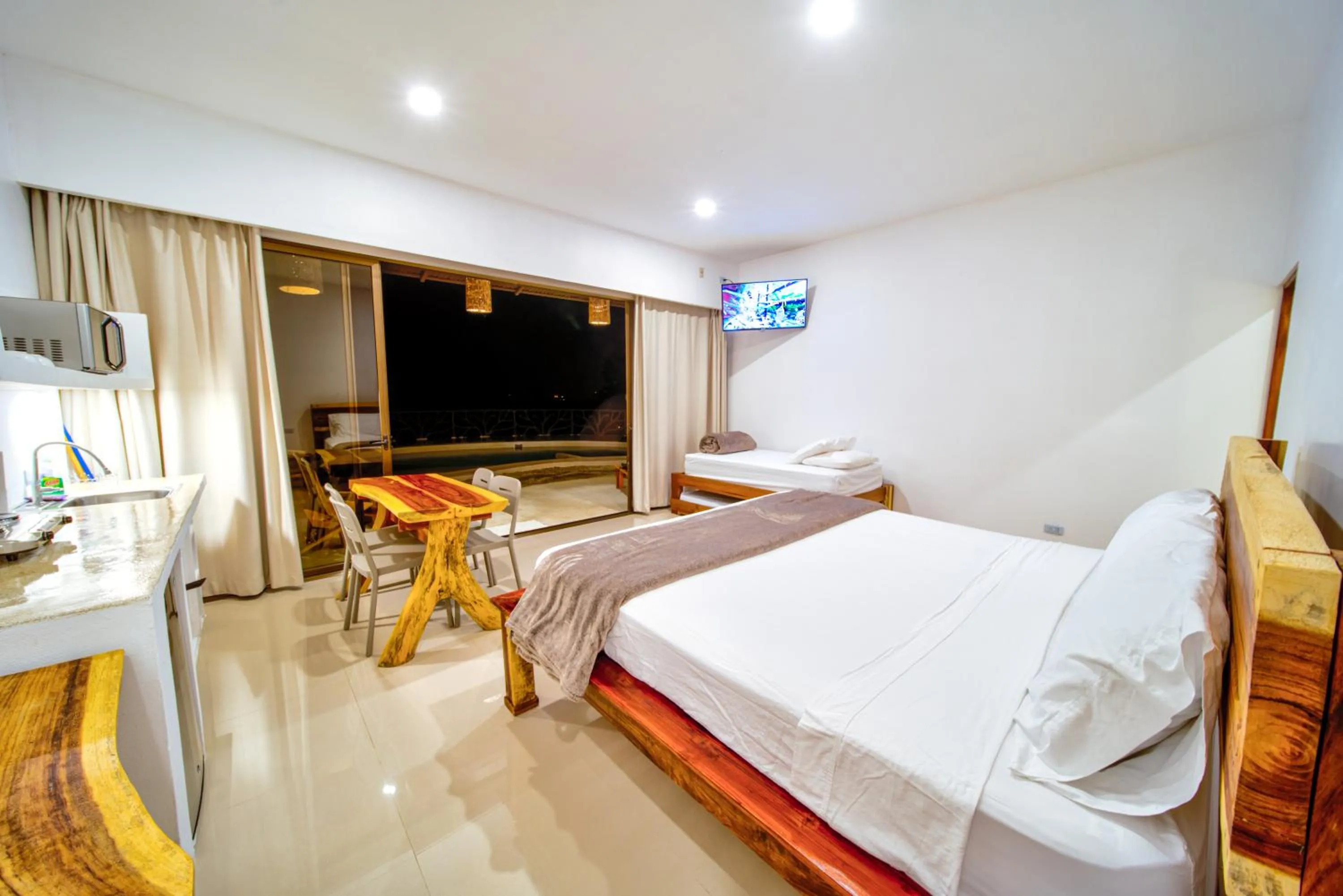 Photo of the whole room, Bed in Akua Suites Ocean View