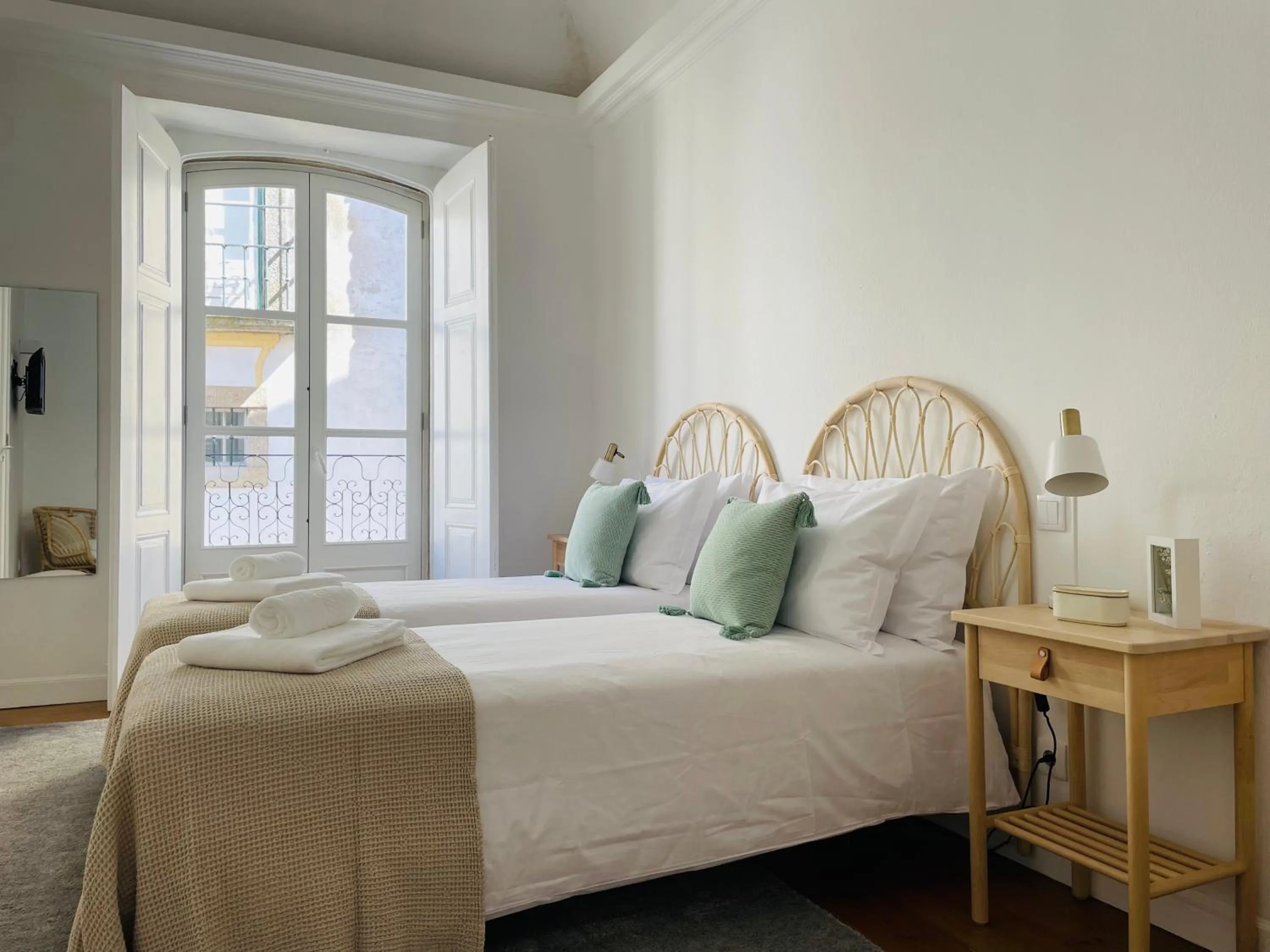 Bed in Casa Soure Suites and Apartments