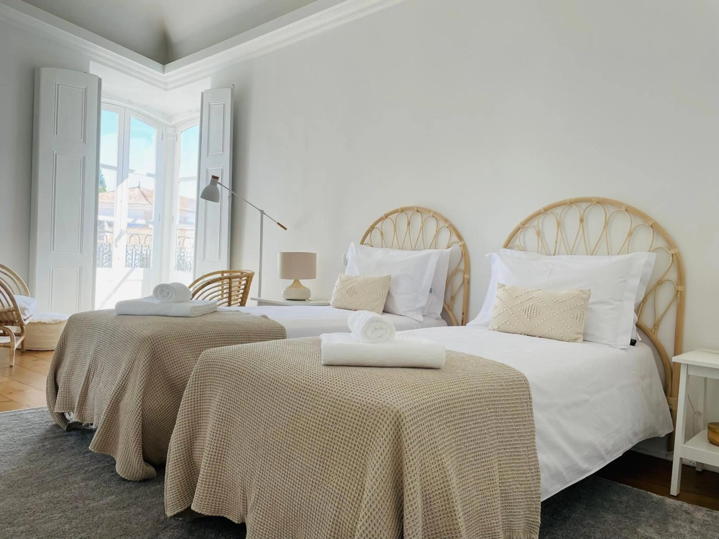 Bed in Casa Soure Suites and Apartments