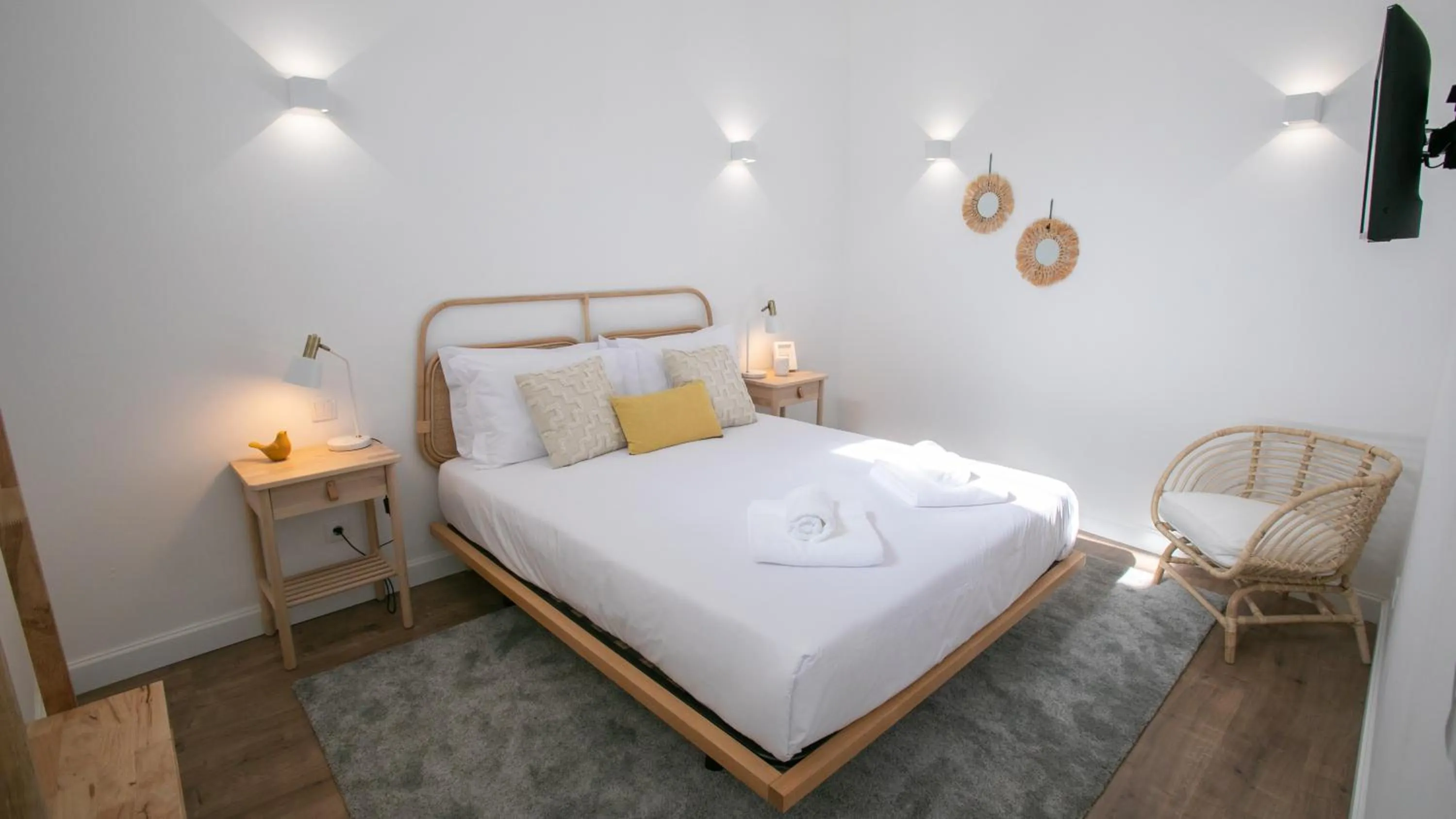 Bed in Casa Soure Suites and Apartments