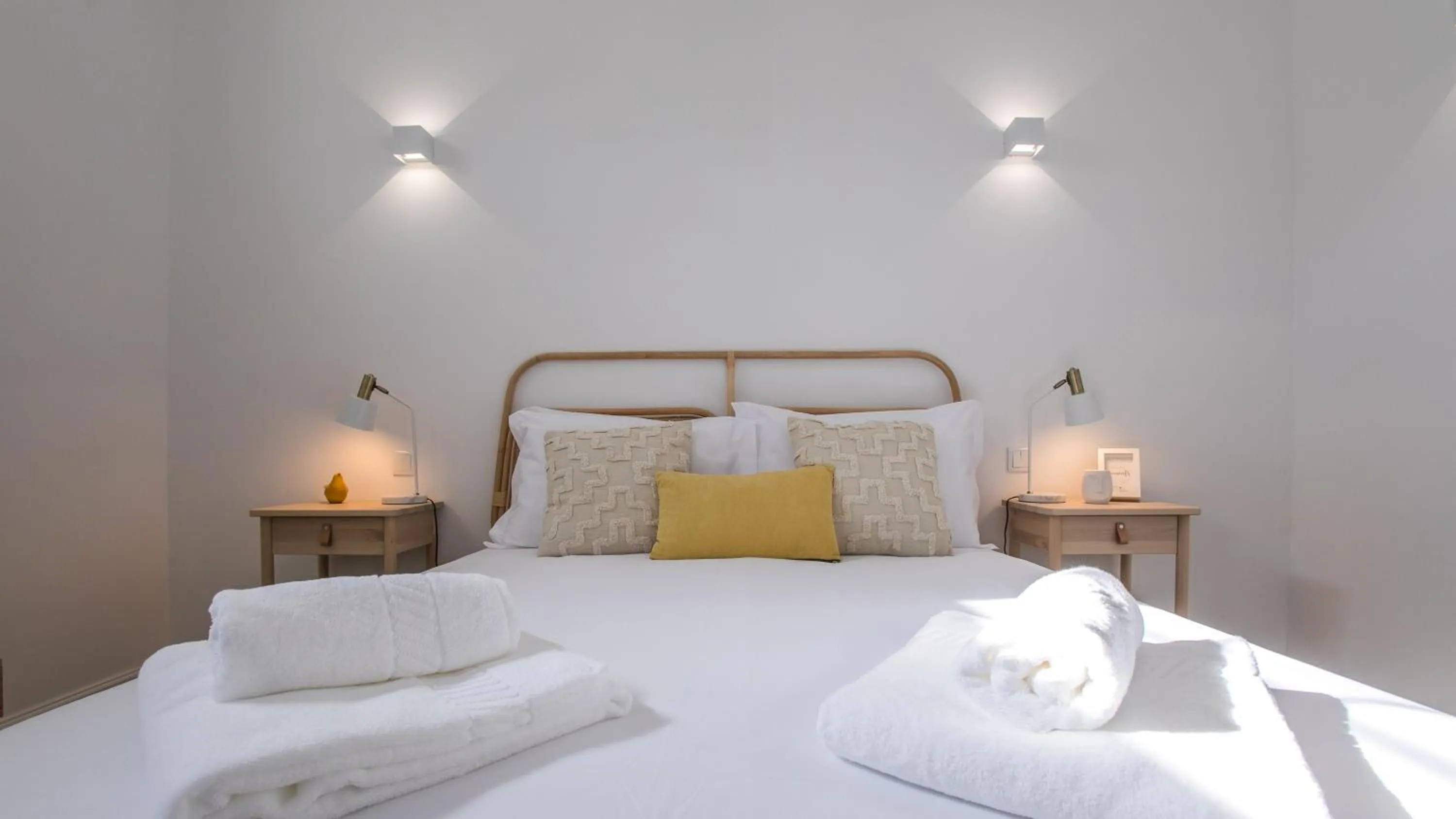 Bed in Casa Soure Suites and Apartments