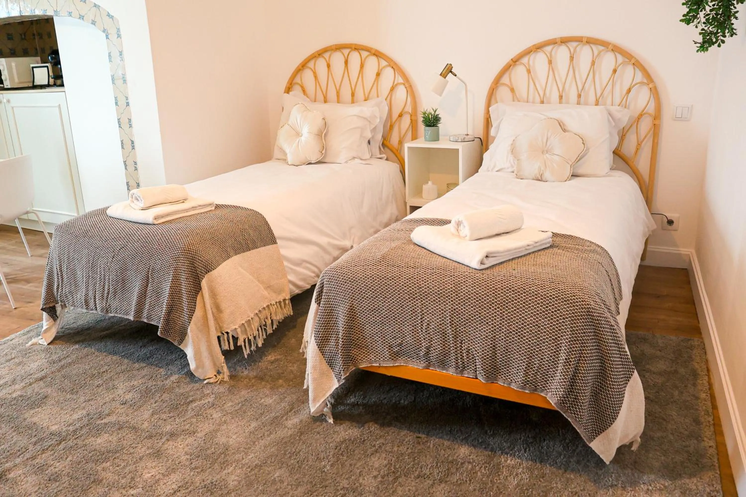 Bed in Casa Soure Suites and Apartments