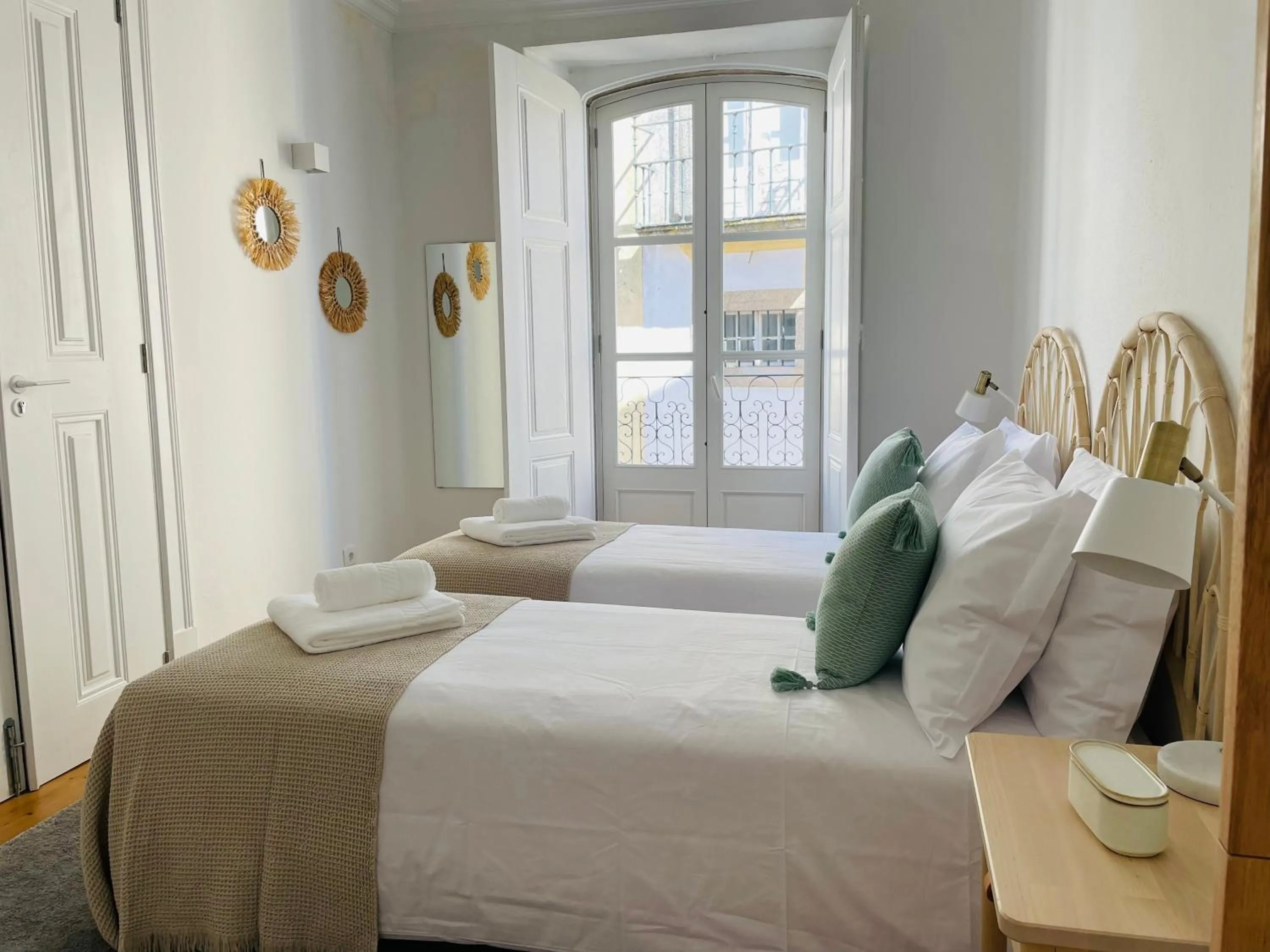 Bed in Casa Soure Suites and Apartments