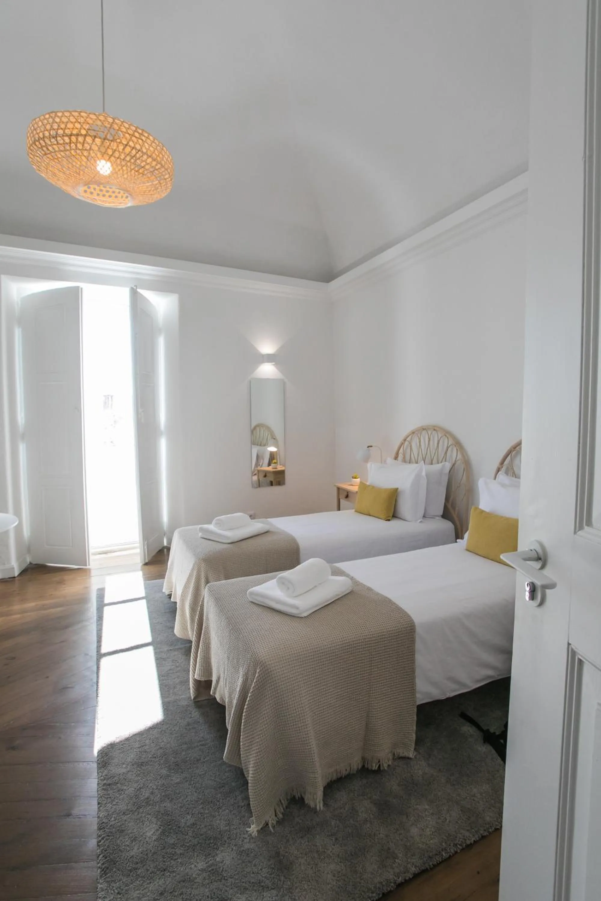 Bed in Casa Soure Suites and Apartments