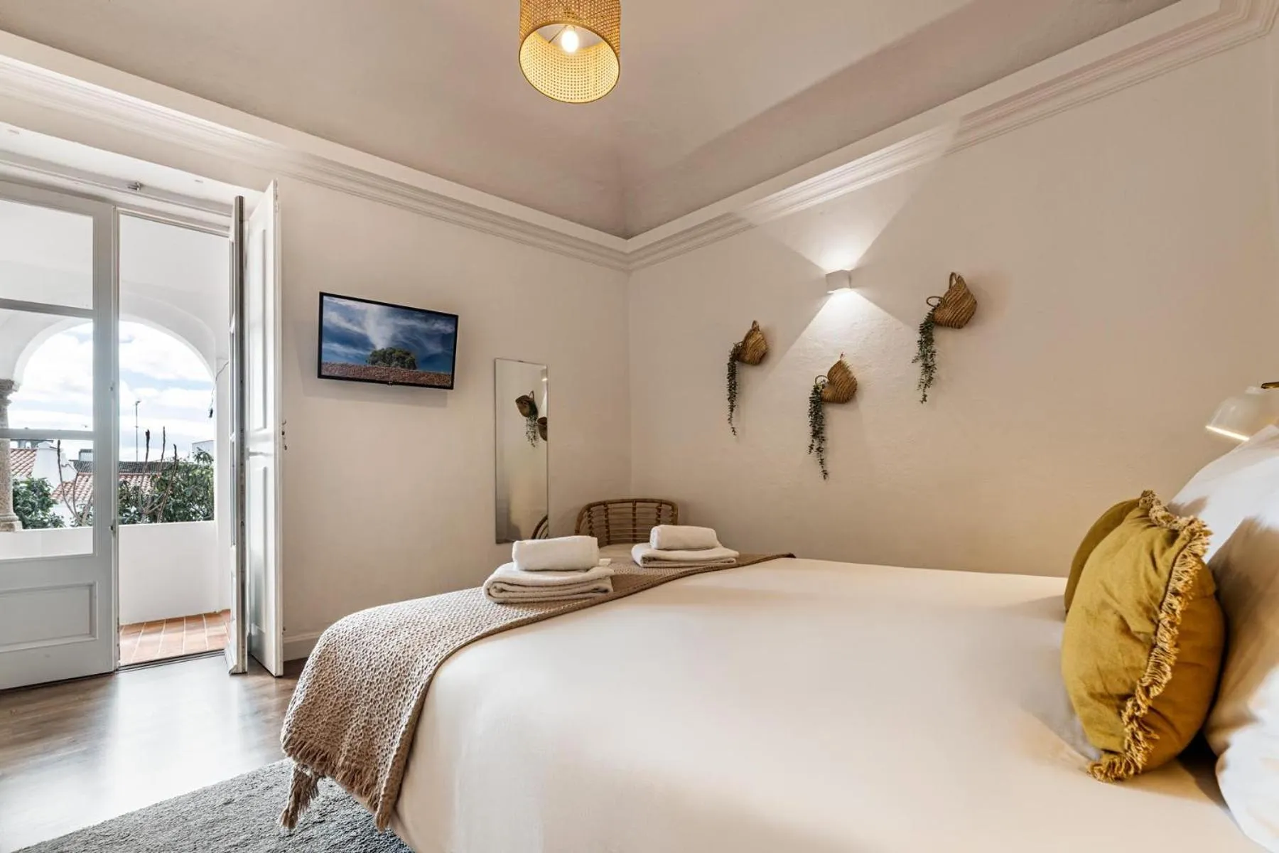 Bed in Casa Soure Suites and Apartments