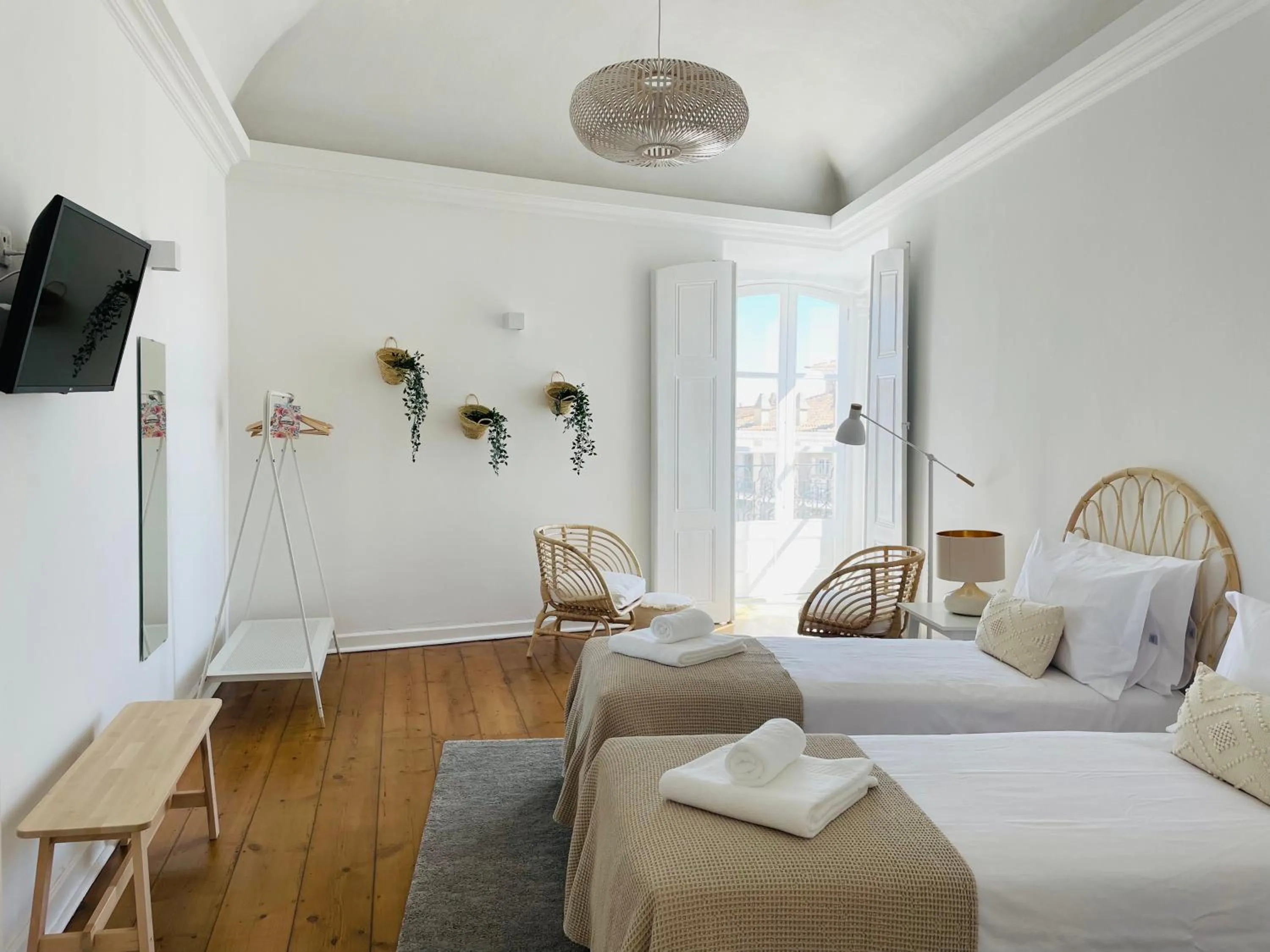 Bed in Casa Soure Suites and Apartments